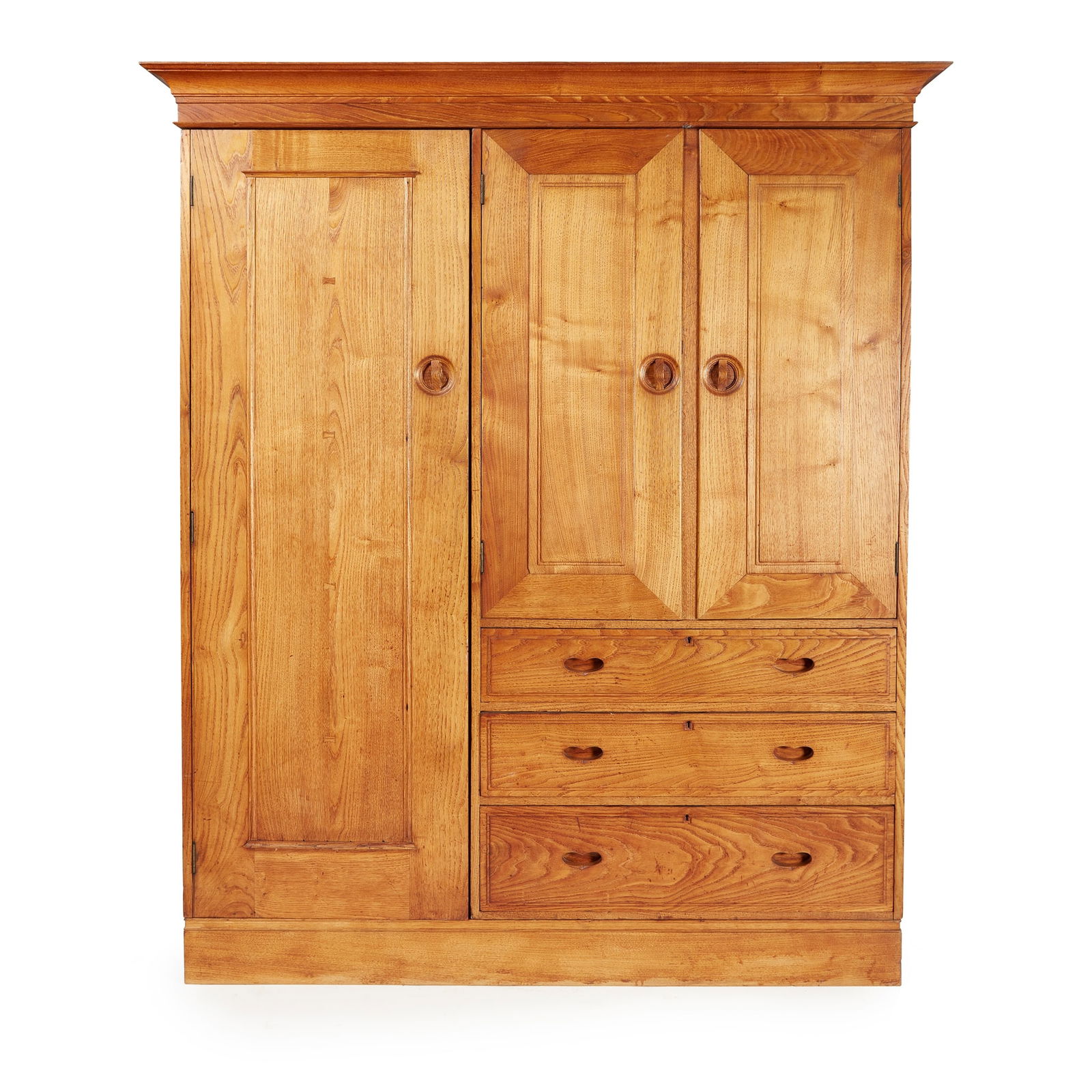 AMBROSE HEAL (1872-1959) FOR HEAL & SON: AMBROSE HEAL (1872-1959) FOR HEAL & SON ARTS & CRAFTS WARDROBE, CIRCA 1910 unpolished chestnut, model 392 165.5cm wide, 203cm high, 59cm deep Provenance: From The Millinery Works Collection. Literatur