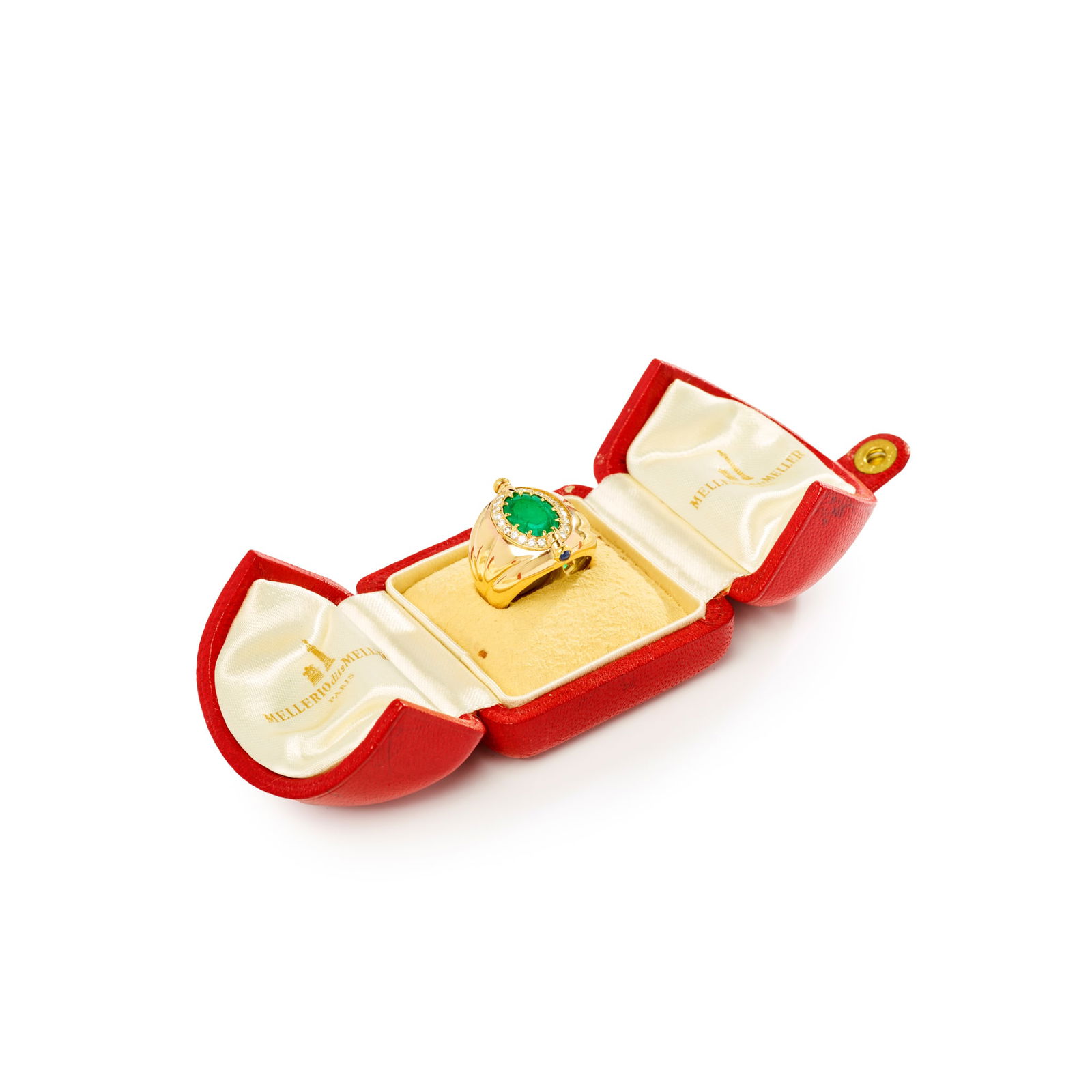 Mellerio dits Meller: A reversable emerald and diamond ring: Mellerio dits Meller: A reversable emerald and diamond ring The wide tapered band centrally featuring a collet-set swivel containing a double-sided emerald, one side cut to an oval cabochon, the rever