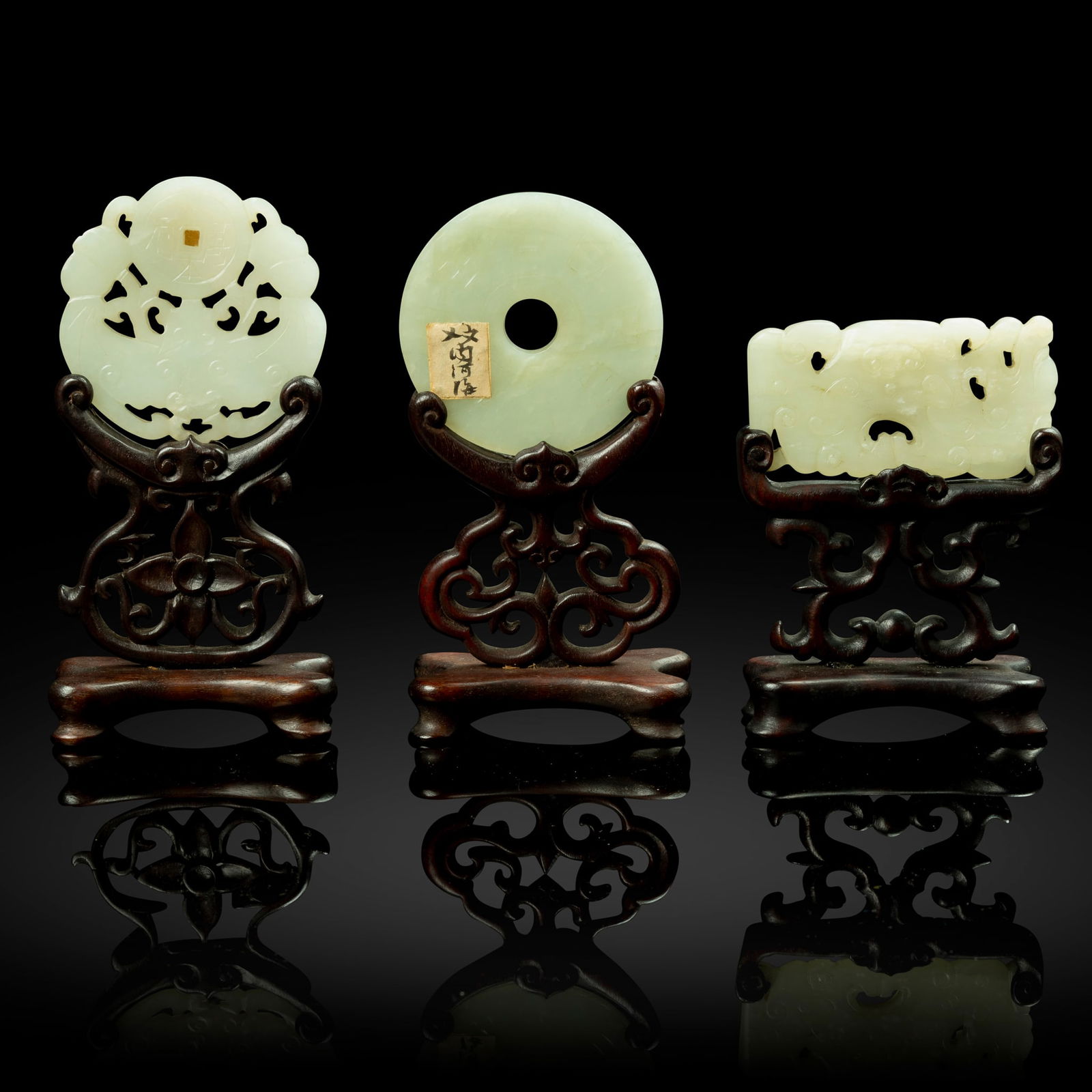 THREE CHINESE CELADON JADE PLAQUES (1 of 2)