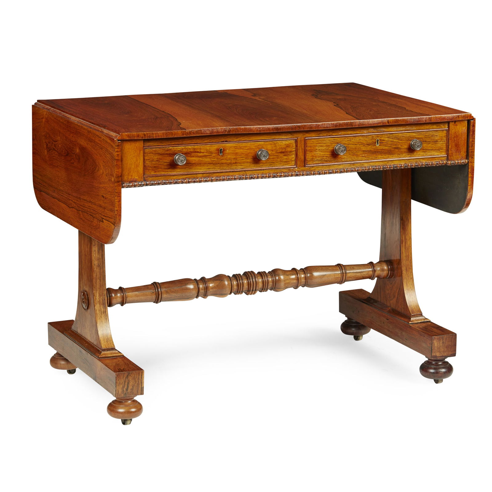 LATE REGENCY ROSEWOOD SOFA TABLE: LATE REGENCY ROSEWOOD SOFA TABLE EARLY 19TH CENTURY the rounded rectangular top with drop leaf ends above a bead moulded frieze with a pair of short frieze drawers to one side and dummy drawers on the