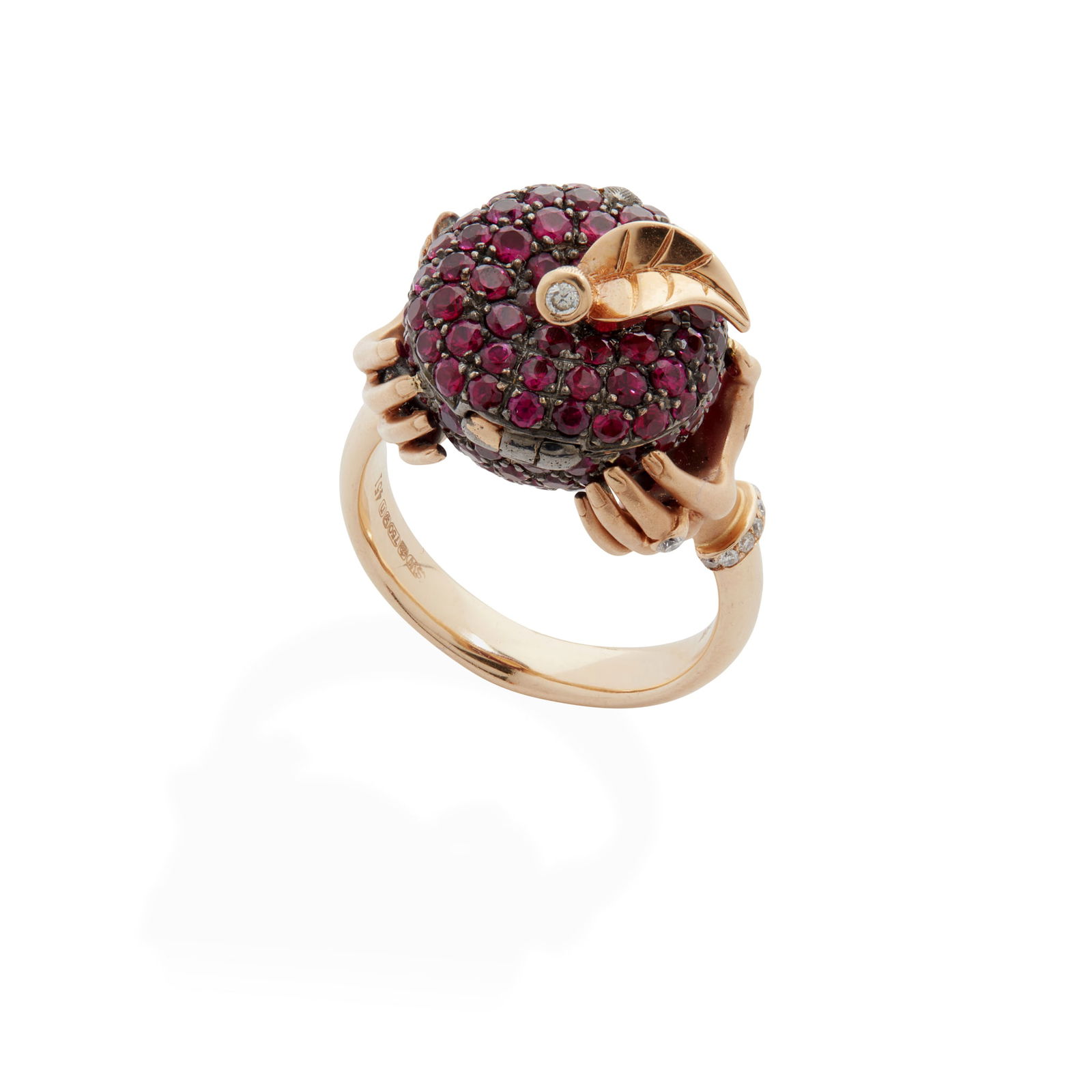 Stephen Webster: An 18ct rose-gold ‘Murder She Wrote’ poison apple ring: Stephen Webster: An 18ct rose-gold ‘Murder She Wrote’ poison apple ring Modelled as hands clasping a pavé-set ruby apple, the hinged lid revealing a hidden compartment, the hands with