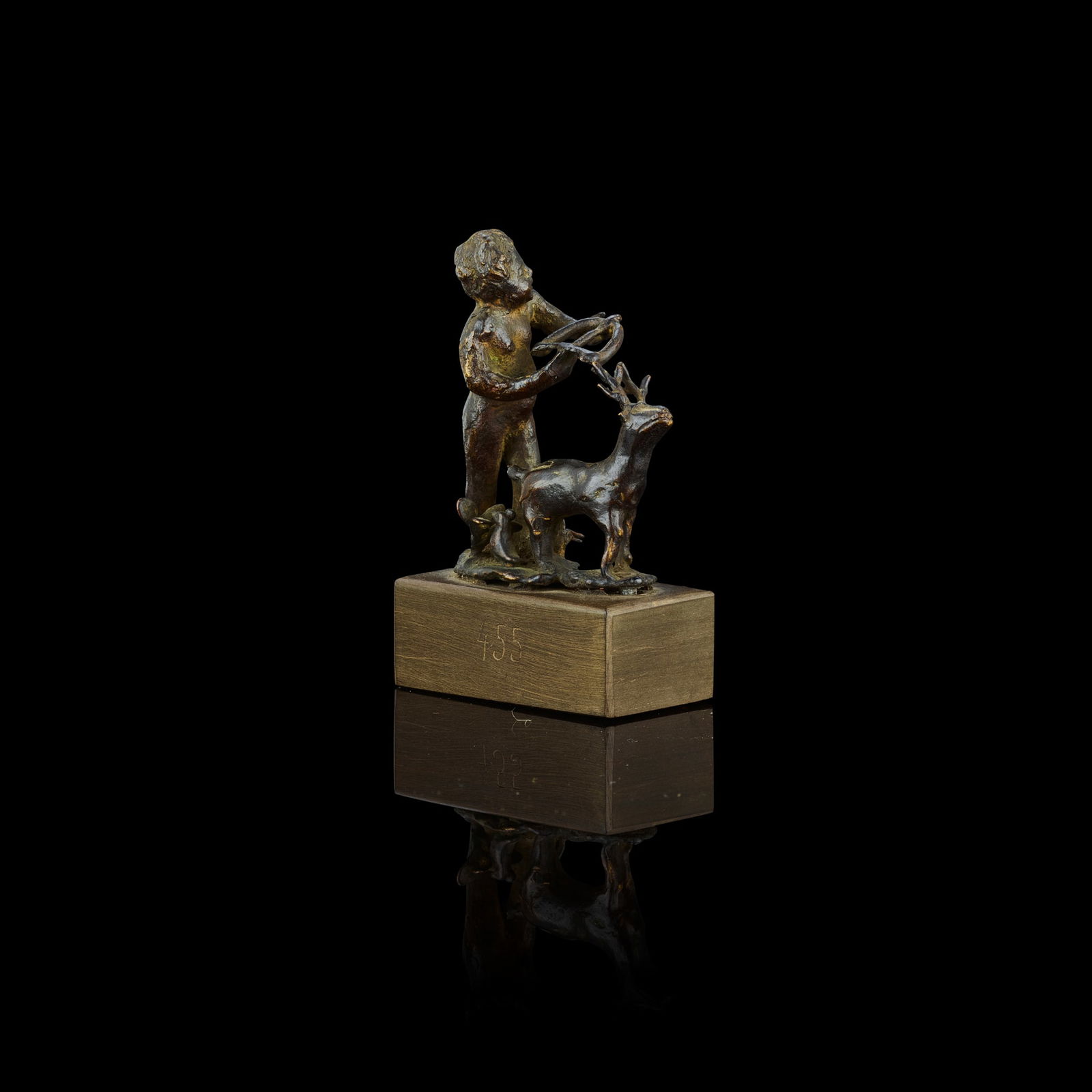 A FLEMISH SMALL BRONZE FIGURE GROUP OF A PUTTO WITH BOW AND ARROW AND A STAG: A FLEMISH SMALL BRONZE FIGURE GROUP OF A PUTTO WITH BOW AND ARROW AND A STAG 16TH CENTURY on a later bronze rectangular plinth, incised with collection number 455; together with AN ITALIAN BRONZE FIGU