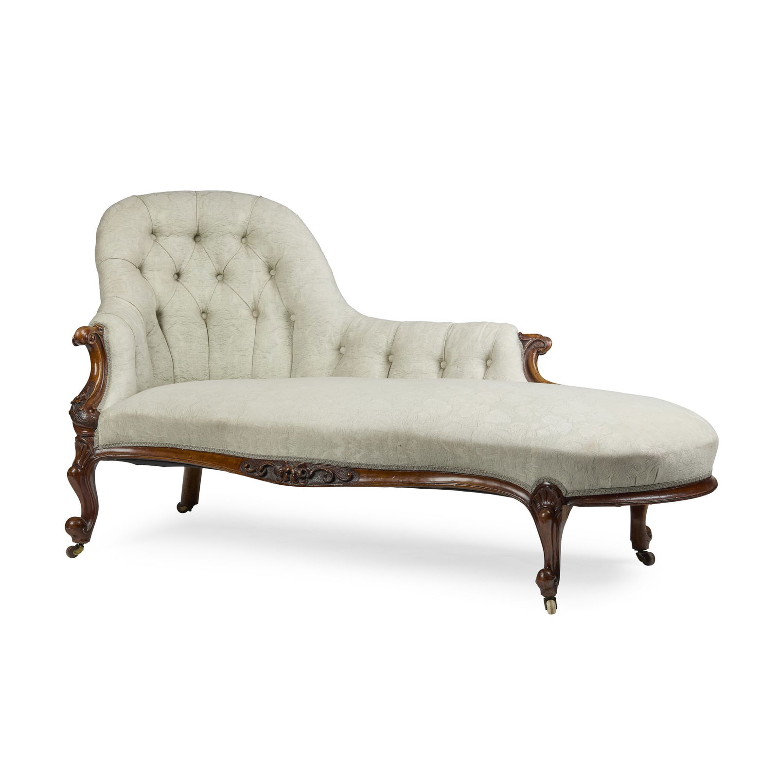 VICTORIAN WALNUT CHAISE LONGUE: VICTORIAN WALNUT CHAISE LONGUE MID 19TH CENTURY the shaped back with buttoned upholstery cream damask style fabric, above a long serpentine seat, raised on short cabriole legs with ceramic castors 165