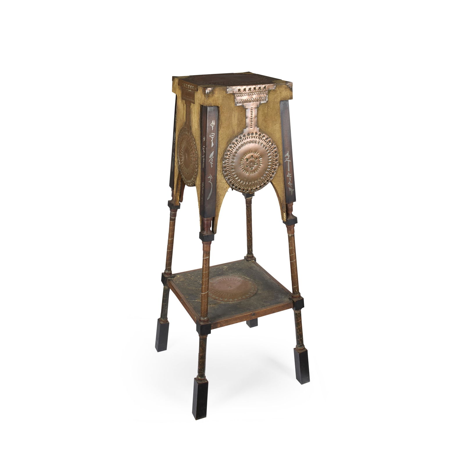 CARLO BUGATTI (1856-1940): CARLO BUGATTI (1856-1940) PLANT STAND, CIRCA 1900 pewter-inlaid walnut, hammered copper, leather and vellum 31cm square to the top, 112cm high