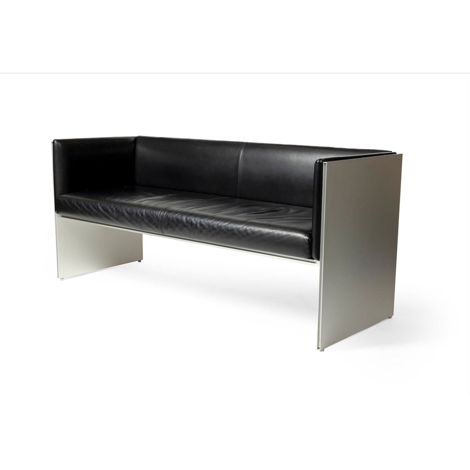 SIR DAVID CHIPPERFIELD C.H., C.B.E., R.A., R.D.I., R.I.B.A. (BRITISH 1953-) FOR CASSINA IXC LTD.: SIR DAVID CHIPPERFIELD C.H., C.B.E., R.A., R.D.I., R.I.B.A. (BRITISH 1953-) FOR CASSINA IXC LTD. 'AIRFRAME' SOFA, DESIGNED 1992 black leather and anodised aluminium 68cm high, 151cm wide, 57cm deep (2