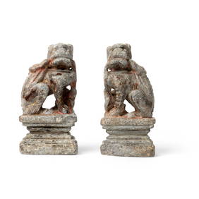 PAIR OF CHINESE GILT AND LACQUERED STONE CRAVINGS OF BUDDHIST-LIONS (1 of 2)