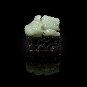 CHINESE PALE CELADON JADE CARVING OF A BUDDHIST LION (1 of 4)