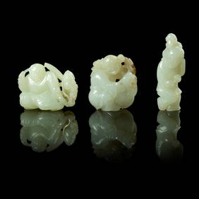 GROUP OF THREE WHITE JADE 'BOYS AT PLAY' CARVINGS (1 of 1)