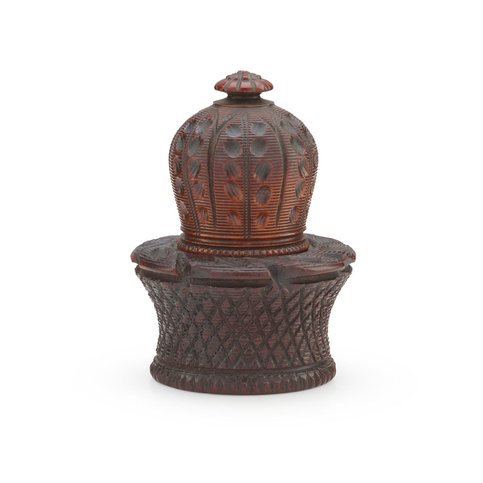 TREEN COQUILLA NUT TABLE NUTMEG GRATER: TREEN COQUILLA NUT TABLE NUTMEG GRATER 19TH CENTURY the upper section carved from a coquilla nut in the form of a stylised acorn with finial and a steel grater, the base in the form of a basket with s