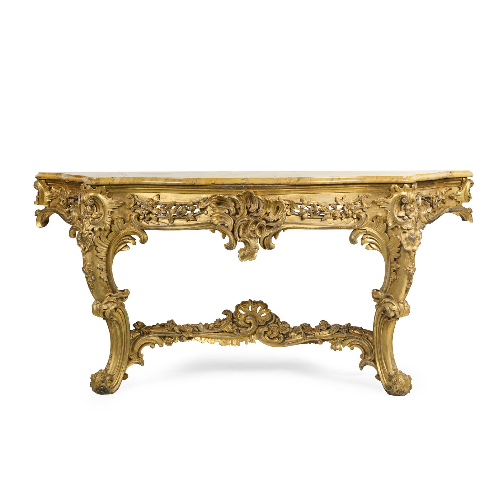 LOUIS XV STYLE GILTWOOD MARBLE TOPPED CONSOLE TABLE: LOUIS XV STYLE GILTWOOD MARBLE TOPPED CONSOLE TABLE 19TH CENTURY the associated serpentine yellow marble top with a moulded edge, above a pierced frieze with flowers, C scrolls, and centred by rocaill
