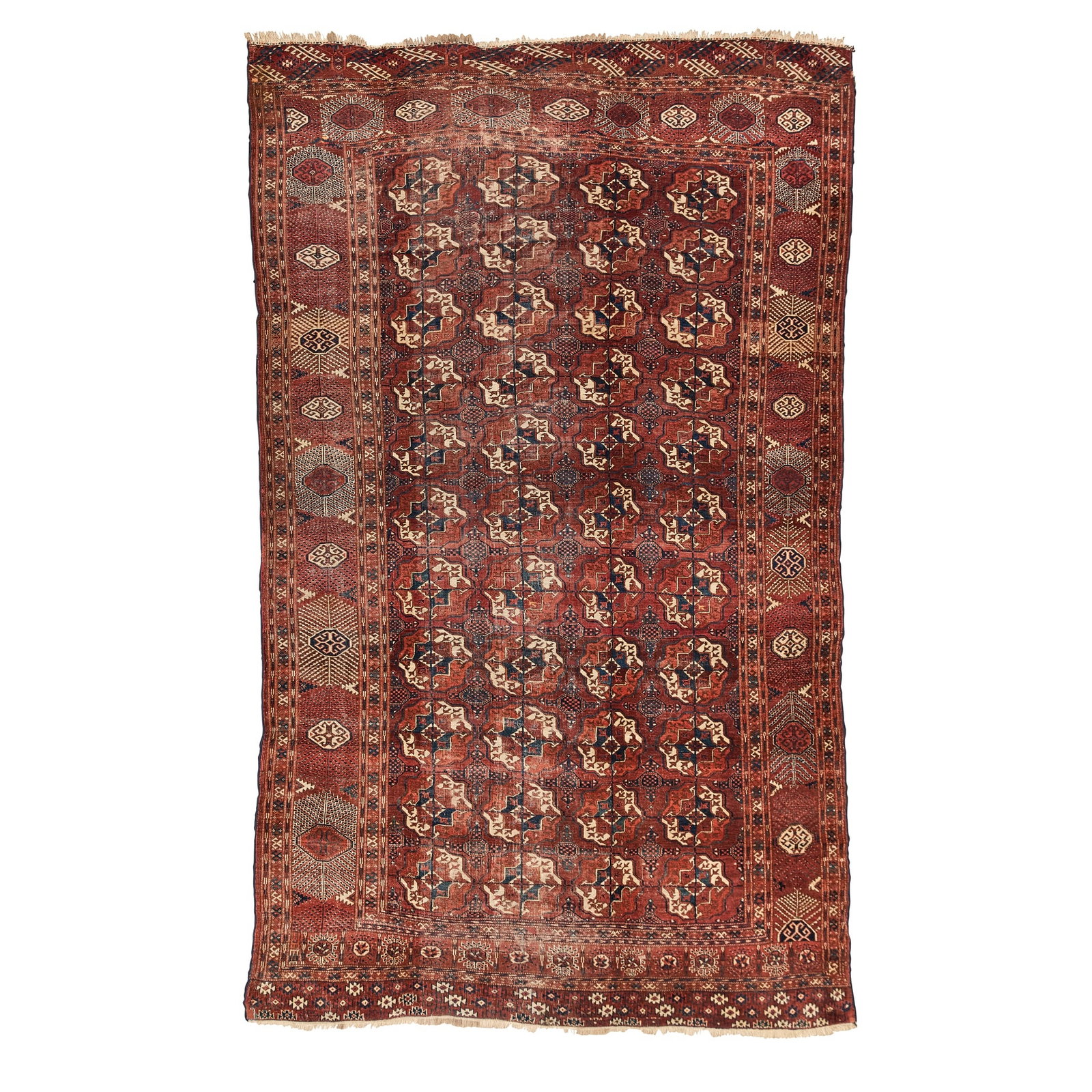 TEKKE CARPET: TEKKE CARPET TURKMENISTAN, LATE 19TH CENTURY the red field with four columns of guls, within red border 359cm x 215cm 