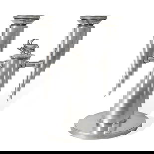 ? GIO PONTI (1891-1979) FOR CHRISTOFLE: GIO PONTI (1891-1979) FOR CHRISTOFLE DOLPHIN GALLIA CANDELABRUM designed 1931white metal, with detachable sconcesstamped O. GALLIA 6092(3) 19.8cm high Between 1927 and 1929 Gio Ponti worked for Christ