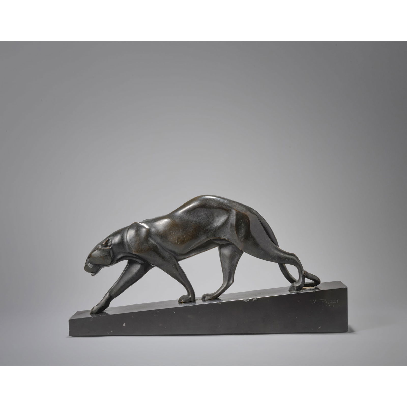 ‡ § MAURICE PROST (1894-1967): MAURICE PROST (1894-1967) PANTHER designed 1920spatinated bronze, marble basebase engraved M. PROST, SUISSE FRES, Editres PARIS 18.5cm high, 37.3cm wide, 6cm deep
