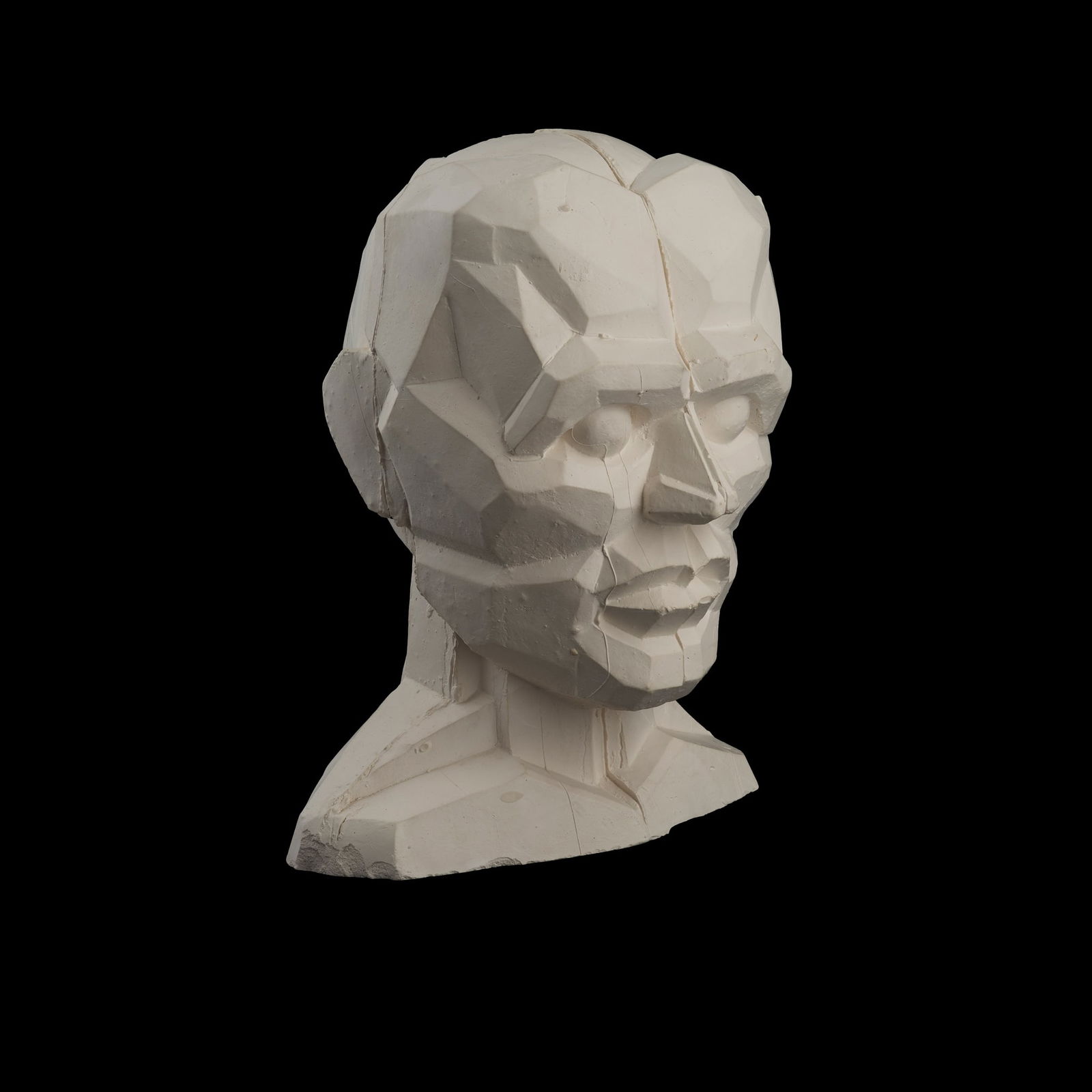 § SIR EDUARDO PAOLOZZI K.B.E., R.A., H.R.S.A. (SCOTTISH 1924-2005): SIR EDUARDO PAOLOZZI K.B.E., R.A., H.R.S.A. (SCOTTISH 1924-2005) GEOMETRIC HEAD (PLASTER) - 1996 Incised with signature and date to neck, plaster 20cm x 15cm x 15cm (8in x 6in x 6in)