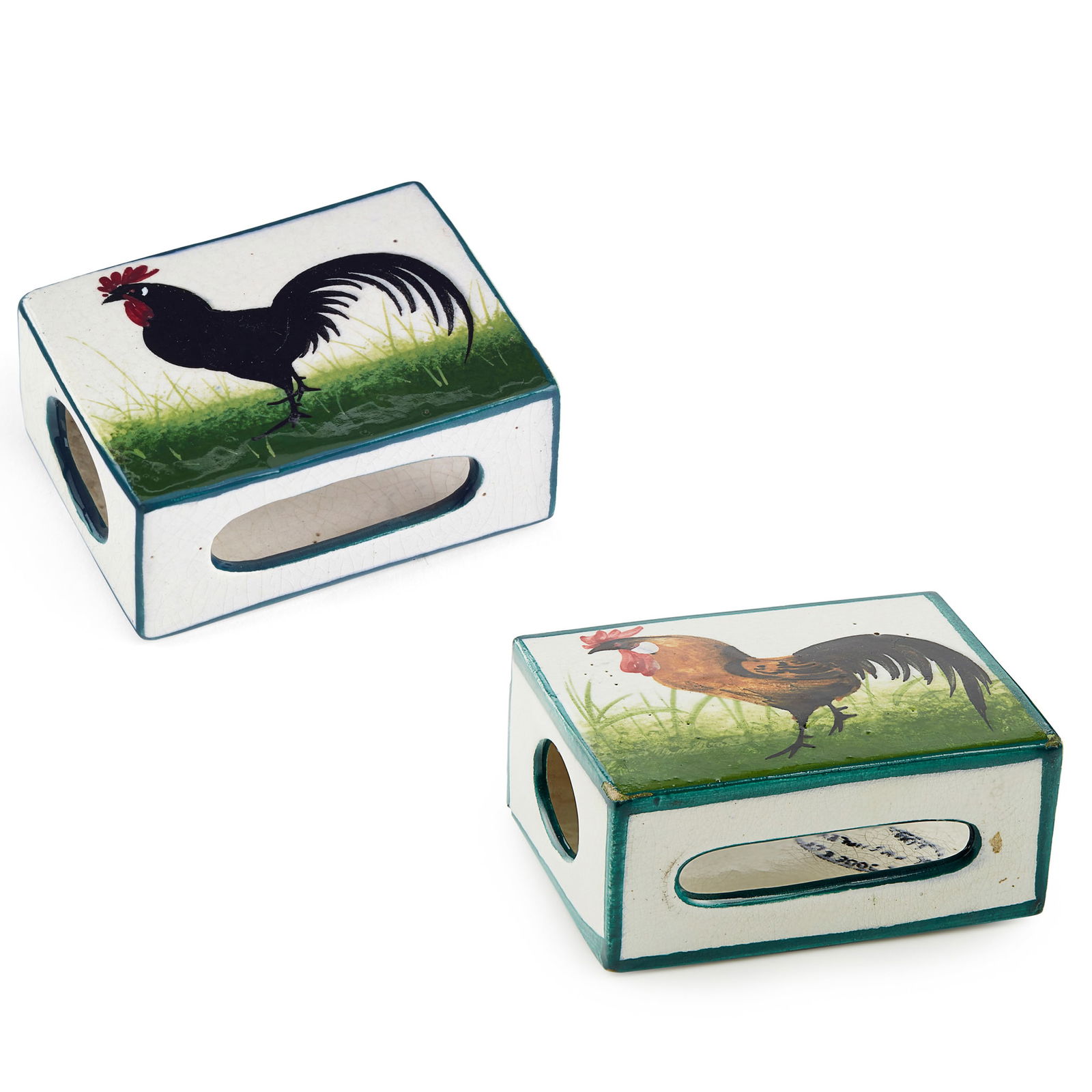 WEMYSS WARE: WEMYSS WARE TWO 'COCKEREL' MATCHBOX CASES to include a 'BROWN COCKEREL' MATCHBOX CASE, glazed earthenware, printed Thomas Goode & Co. retailer's mark, 7.8cm wide; a 'BLACK COCKEREL' MATCHBOX CASE, gla