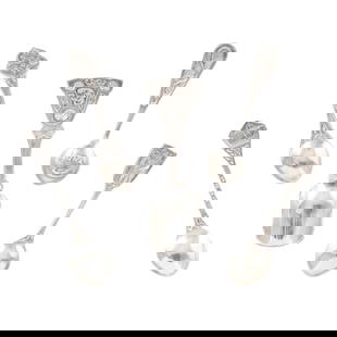 IONA - A CASED SET OF MATCHED SCOTTISH PROVINCIAL SPOONS: IONA - A CASED SET OF MATCHED SCOTTISH PROVINCIAL SPOONS ALEXANDER RITCHIE comprising a sugar spoon, marked A.R. IONA, hallmarks for Glasgow, 1932; one spoon marked A.R. IONA and three others with ful