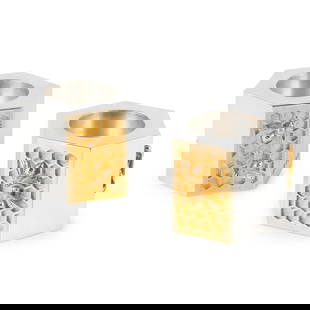 A PAIR OF MODERN 'HONEYCOMB' CANDLESTICKS: A PAIR OF MODERN 'HONEYCOMB' CANDLESTICKS GRAHAM STEWART, EDINBURGH 2015 of hexagonal form, modelled as a honeycomb, three sides with a silver-gilt honeycomb design and applied bees, feature hallmarks