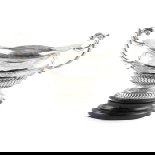 A VICTORIAN LARGE CENTREPIECE BOWL: A VICTORIAN LARGE CENTREPIECE BOWL HAMILTON & INCHES, EDINBURGH 1897 Of shaped oval outline with tapered body, the lower section with fluted decoration, the oval stepped foot similarly decorated, with