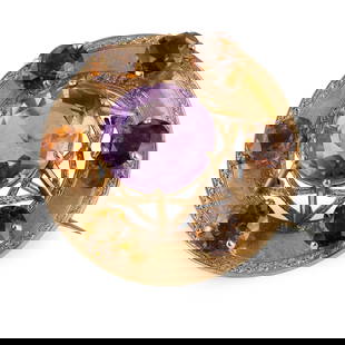 A VICTORIAN GOLD GEM-SET BROOCH: A VICTORIAN GOLD GEM-SET BROOCH UNMARKED of circular outline, stylised claw-set to the centre with a facetted amethyst in a border of six facetted citrines, to an unmarked yellow metal brooch with loo