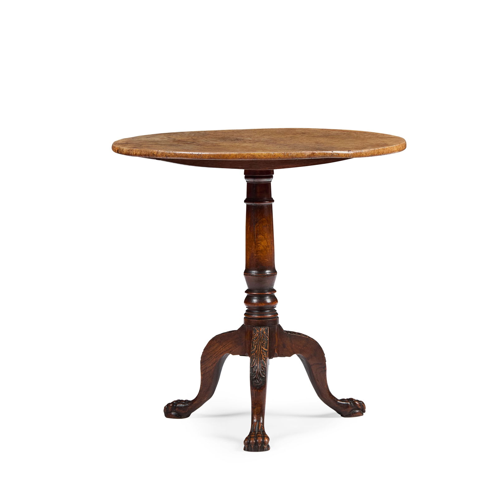 GEORGE II POLLARD OAK TRIPOD TABLE: GEORGE II POLLARD OAK TRIPOD TABLE SECOND QUARTER 18TH CENTURY the circular tilt top on a canon barrel column and leaf carved cabriole legs ending in paw feet 74.5cm diameter, 74cm high