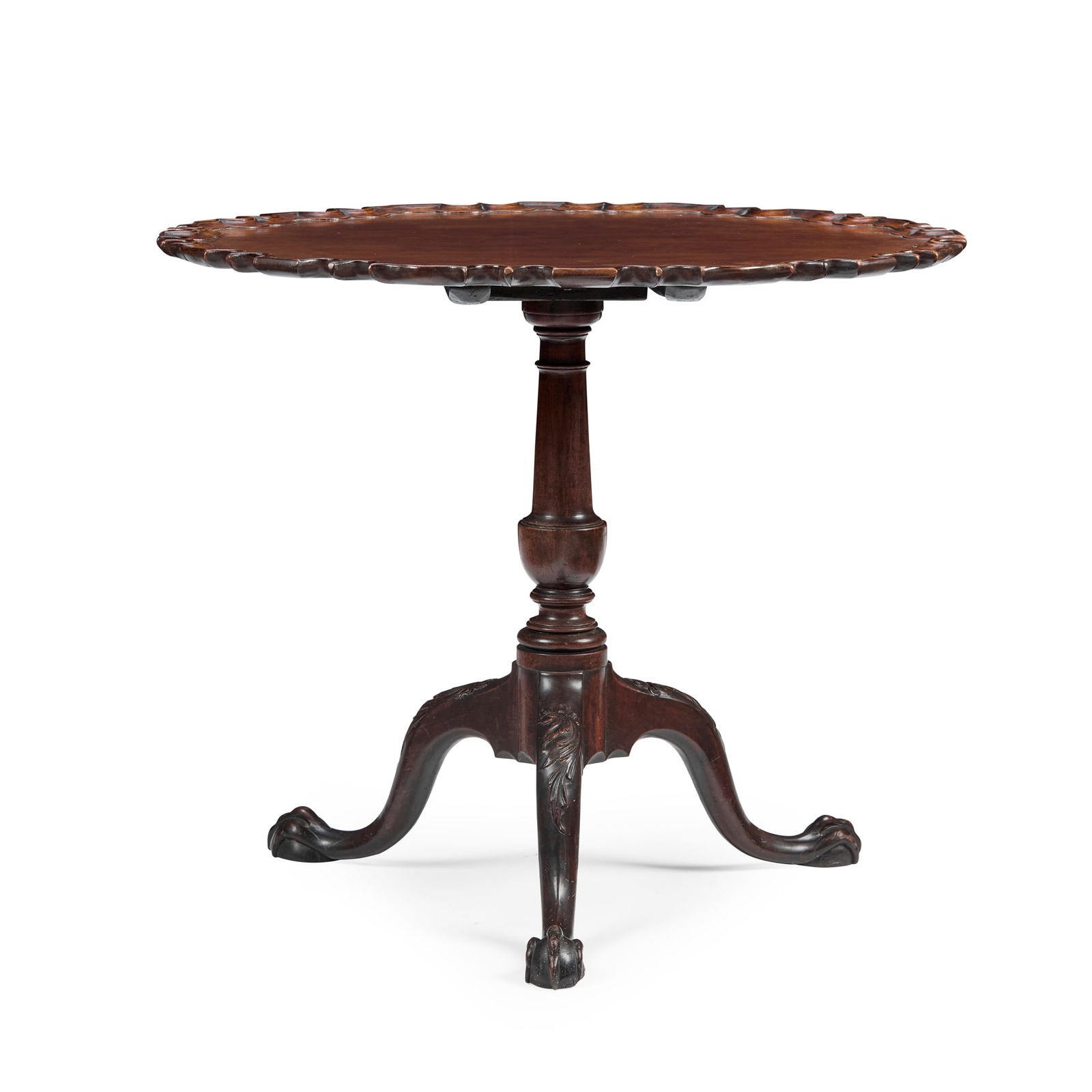 EARLY GEORGE III MAHOGANY PIECRUST TRIPOD TEA TABLE: EARLY GEORGE III MAHOGANY PIECRUST TRIPOD TEA TABLE MID 18TH CENTURY the circular tilt top with a moulded piecrust edge, raised on a baluster support and acanthus carved cabriole legs ending in claw a
