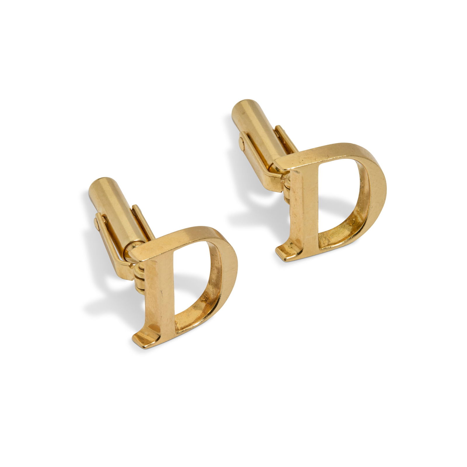 Mappin & Webb: A pair of 18ct gold cufflinks: Mappin & Webb: A pair of 18ct gold cufflinks Principal D-shaped terminals, secondary torpedo terminals, UK hallmark Width of principal terminal: 1.5cm