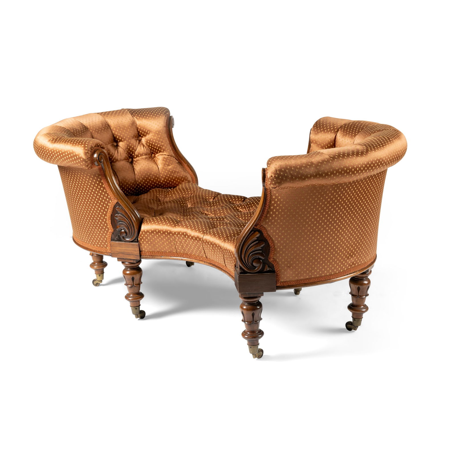 AN EARLY VICTORIAN WALNUT AND BUTTON-UPHOLSTERED LOVE SEAT