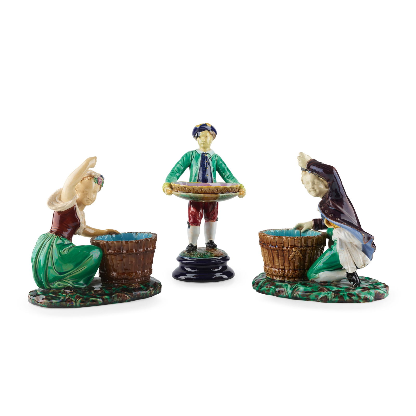 MINTON'S: MINTON'S PAIR OF MAJOLICA FIGURAL COMPORTS, 1863 glazed earthenware, one unmarked and one stamped MINTON with date mark, 21cm high; together with a JOSEPH HOLDCROFT FIGURAL DISH, 24cm high (3) The Mic