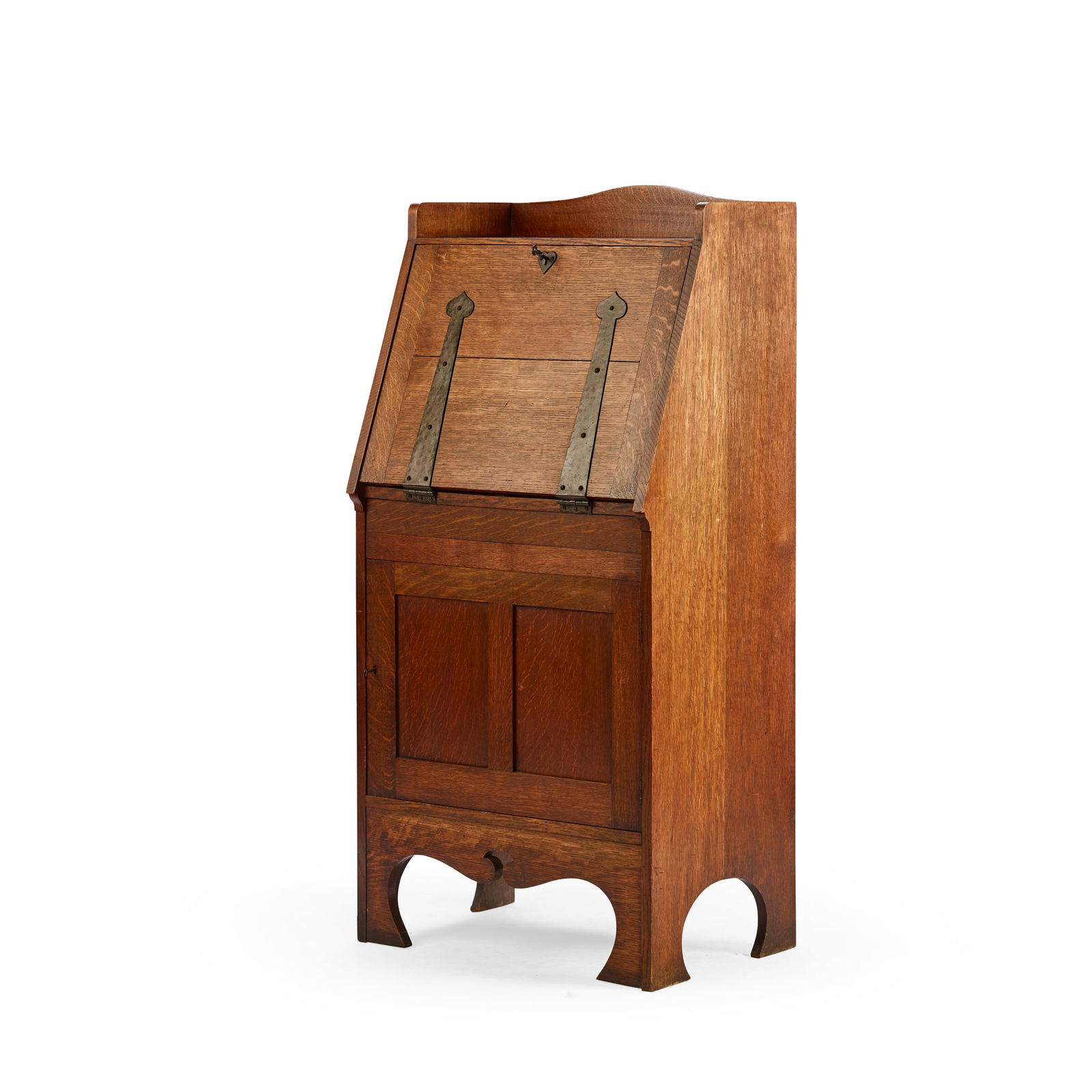 AMBROSE HEAL (1872-1959) FOR HEAL & SON: AMBROSE HEAL (1872-1959) FOR HEAL & SON ARTS & CRAFTS '304' BUREAU, CIRCA 1898 oak, with iron fittings, stamped to the fall HEAL & SON LONDON 60.2cm wide, 126cm high, 43cm deep Literature: Heal