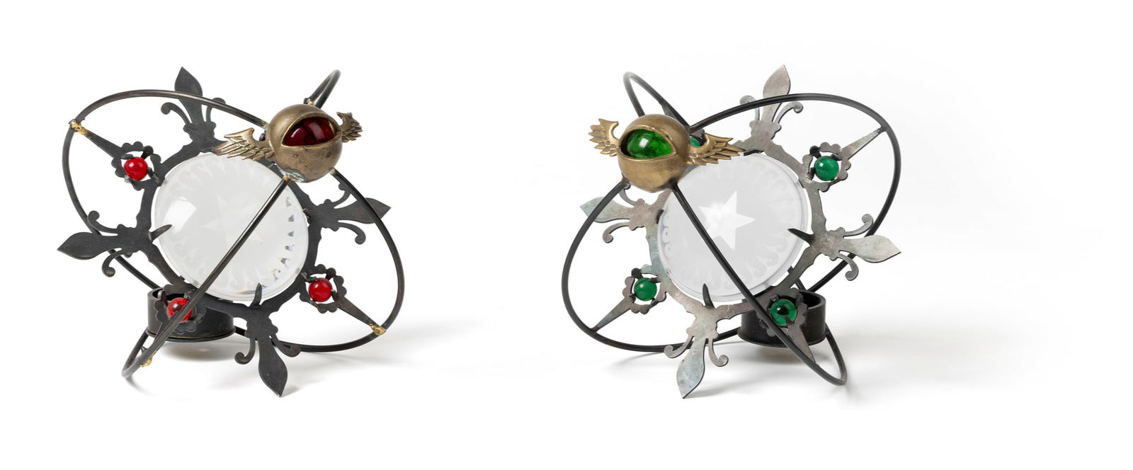 § MARK BRAZIER-JONES (BRITISH 1956-): MARK BRAZIER-JONES (BRITISH 1956-) TWO 'ASTRO CHARGER' CANDLE HOLDERS patinated metal, frosted and coloured glass 16.5cm high, 20cm wide (6 ½in high, 8in wide); 17cm high, 21cm wide (6 ¾in h