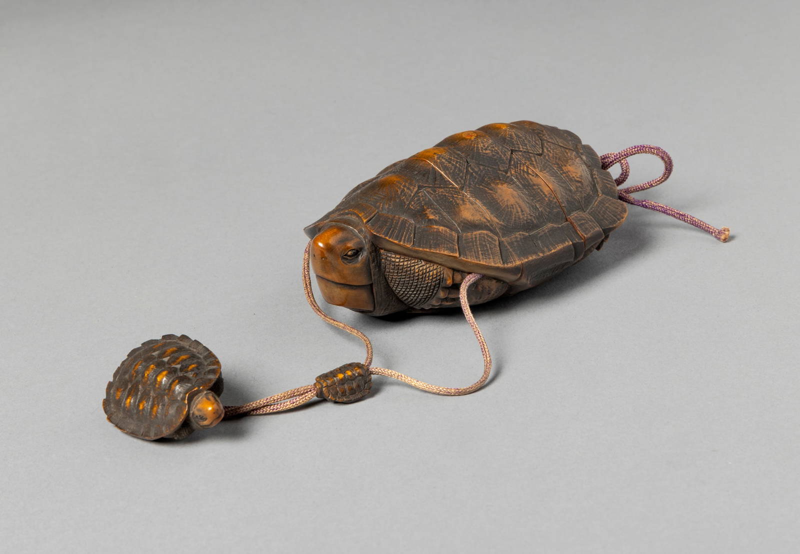 [COLLECTION OF PROF. J. GILBERT & CORA MCALLISTER] JAPANESE BOXWOOD TWO-CASE INRO, OJIME AND NETSUKE
