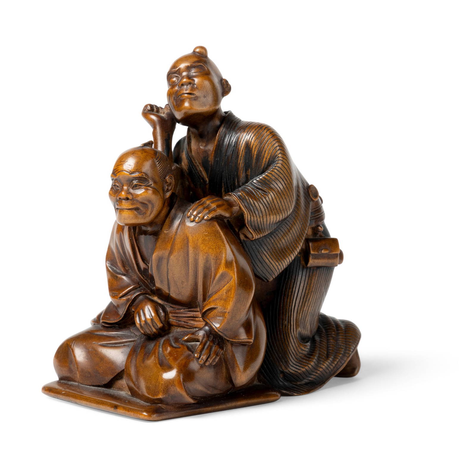 [PRIVATE SCOTTISH COLLECTION, EDINBURGH] JAPANESE WOOD OKIMONO OF 'BLIND MASSEUR' FIGURAL GROUP