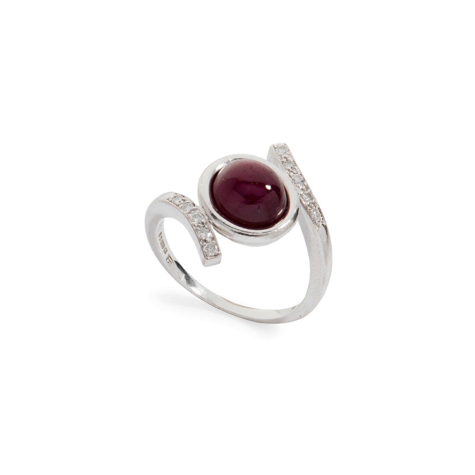 Andrew Grima: A ruby and diamond ring, 1979: Andrew Grima: A ruby and diamond ring, 1979 Collet-set with a cabochon ruby, between crossover design brilliant-cut diamond shoulders, signed Grima, rubbed maker's mark, UK hallmark Ring size: R