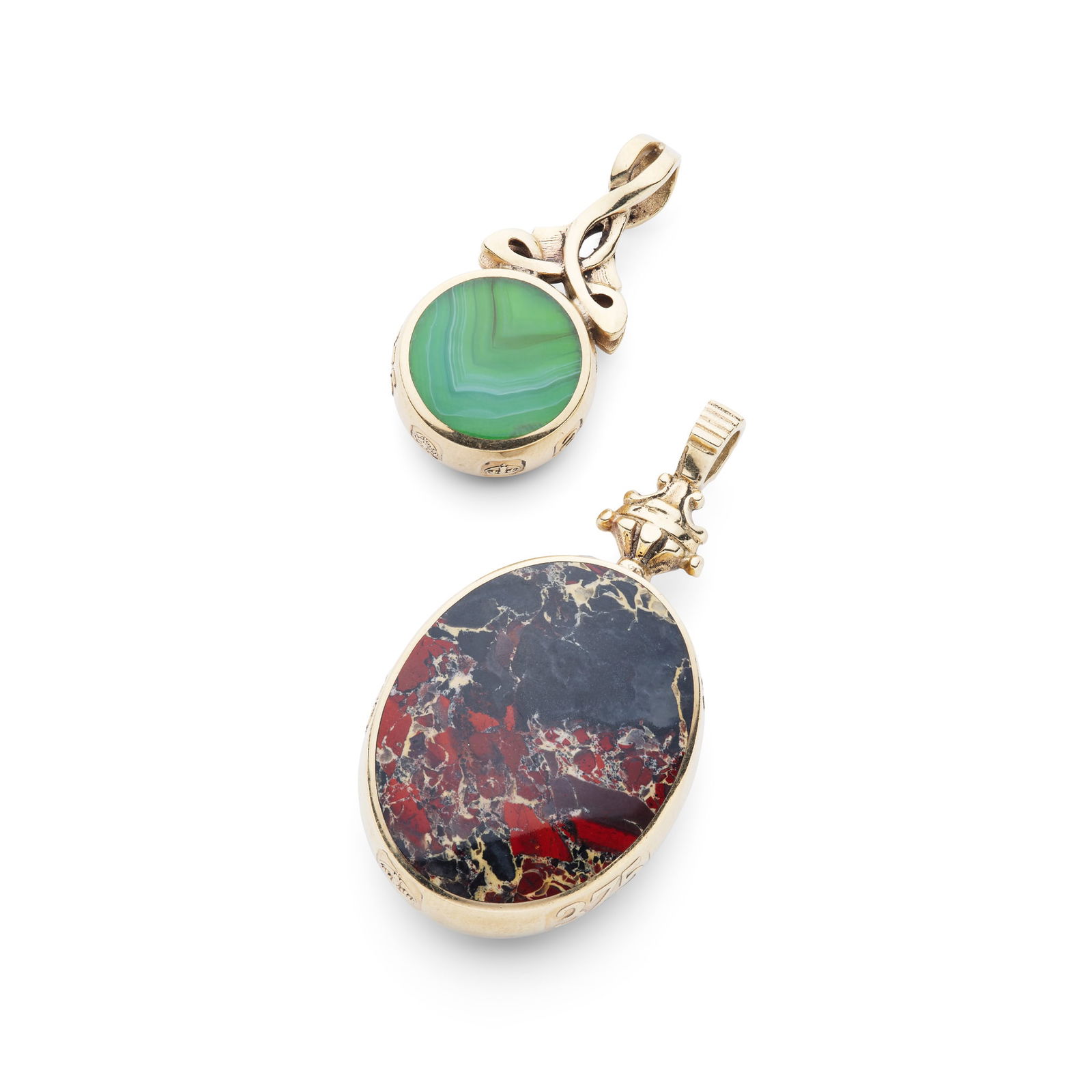 Two 9ct gold Agate pendants: Two 9ct gold Agate pendants The first of oval outline, set with two large agate panels; the second with Celtic knot-style bale, set with a banded agate and malachite panel, both with feature hallmarks