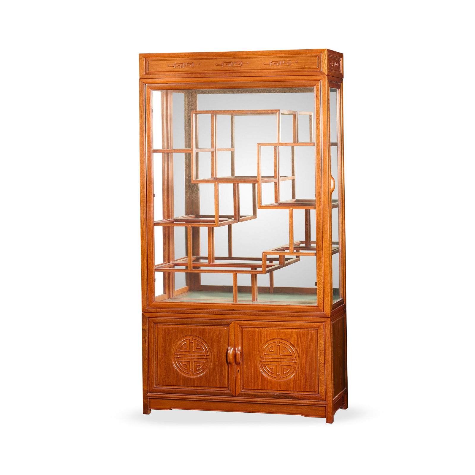 CHINESE WOODEN DISPLAY CABINET: CHINESE WOODEN DISPLAY CABINET 硬木百寶閣in three sections, the middle largest section with irregular tiers, lower part a storage with two-panel doors, top and lower area