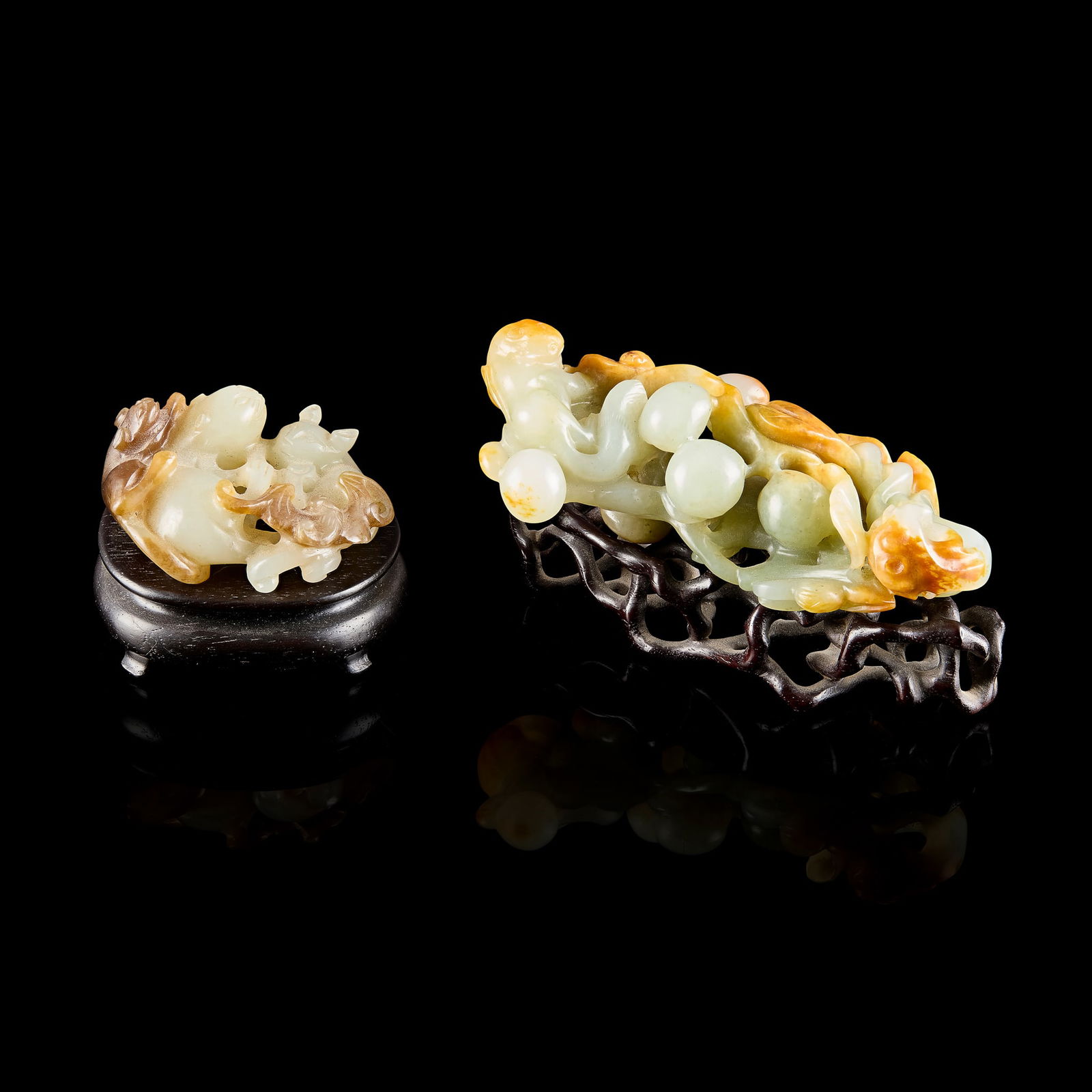 TWO CHINESE JADE CARVINGS: TWO CHINESE JADE CARVINGS 19TH-20TH CENTURY 十九至二十世紀 青玉巧雕福貓 及