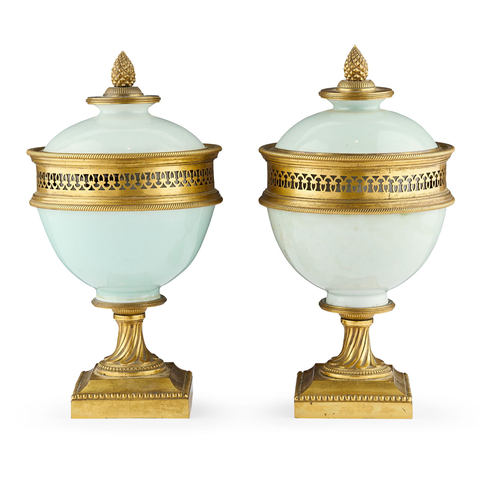 NEAR PAIR OF CHINESE CELADON-GLAZED BOWLS WITH GILT-BRONZE MOUNTS: NEAR PAIR OF CHINESE CELADON-GLAZED BOWLS WITH GILT-BRONZE MOUNTS ONE WITH QIANLONG MARK 乾隆款 青釉蓋碗後嵌銅鎏金底ॷ