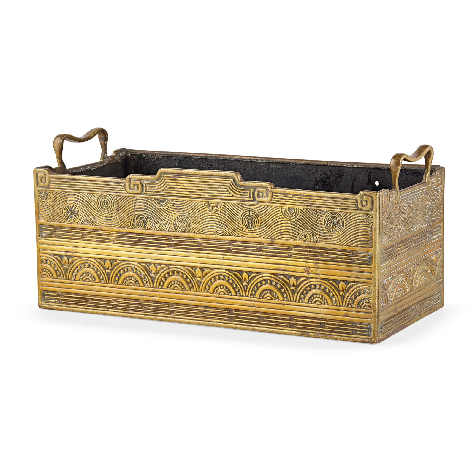 THOMAS JECKYLL (1827-1881) FOR ROBBINS & CO.: THOMAS JECKYLL (1827-1881) FOR ROBBINS & CO. AESTHETIC MOVEMENT PLANTER, CIRCA 1880 repoussé-decorated brass, patinated iron 45.5cm wide, 21cm high, 17cm deep