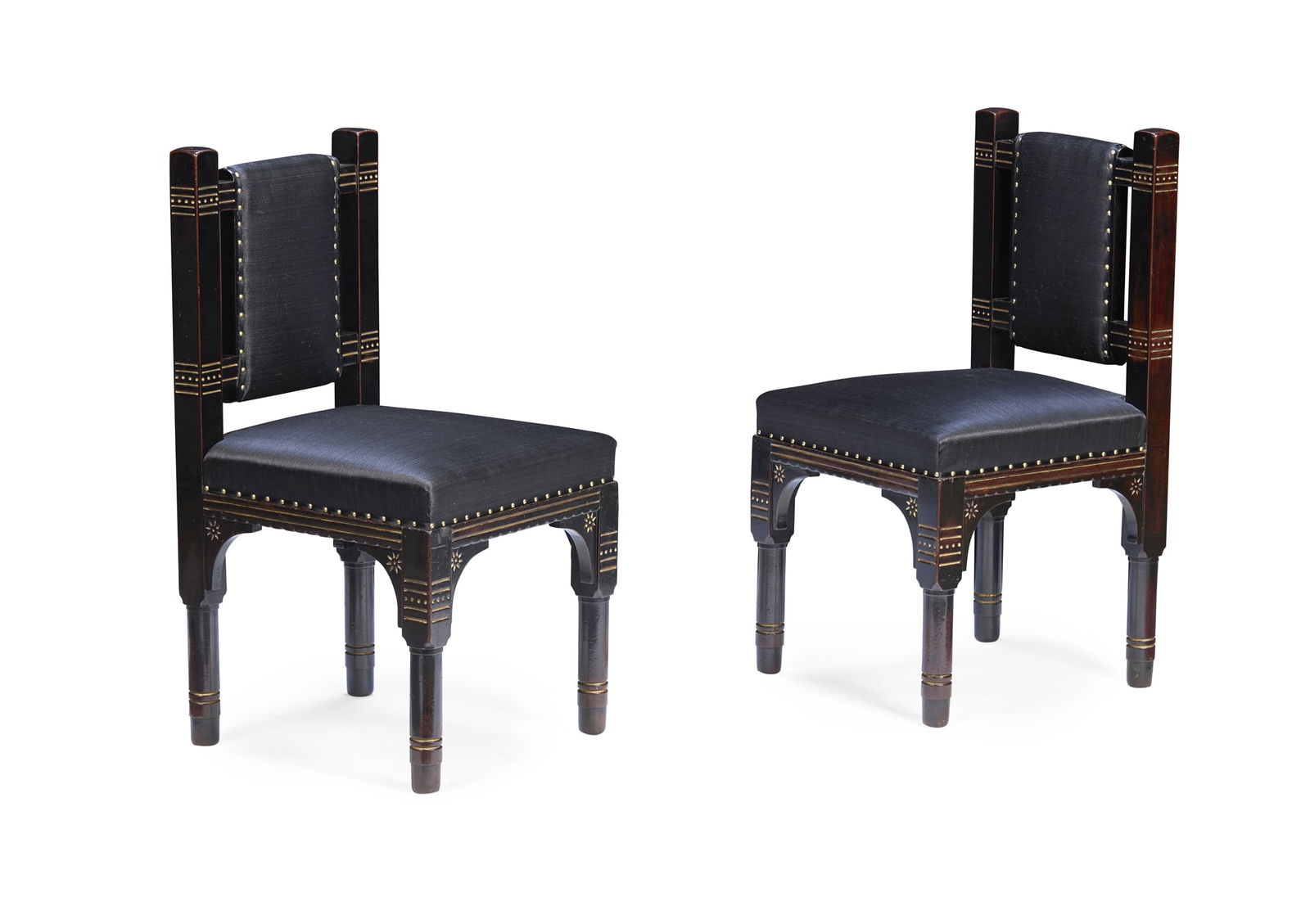 ATTRIBUTED TO CHRISTOPHER DRESSER (1834-1904) FOR THE ART FURNISHER'S ALLIANCE: ATTRIBUTED TO CHRISTOPHER DRESSER (1834-1904) FOR THE ART FURNISHER'S ALLIANCE PAIR OF SIDE CHAIRS, CIRCA 1880 ebonised wood, with incised and gilded decoration and upholstered seats and backs (2) 47.