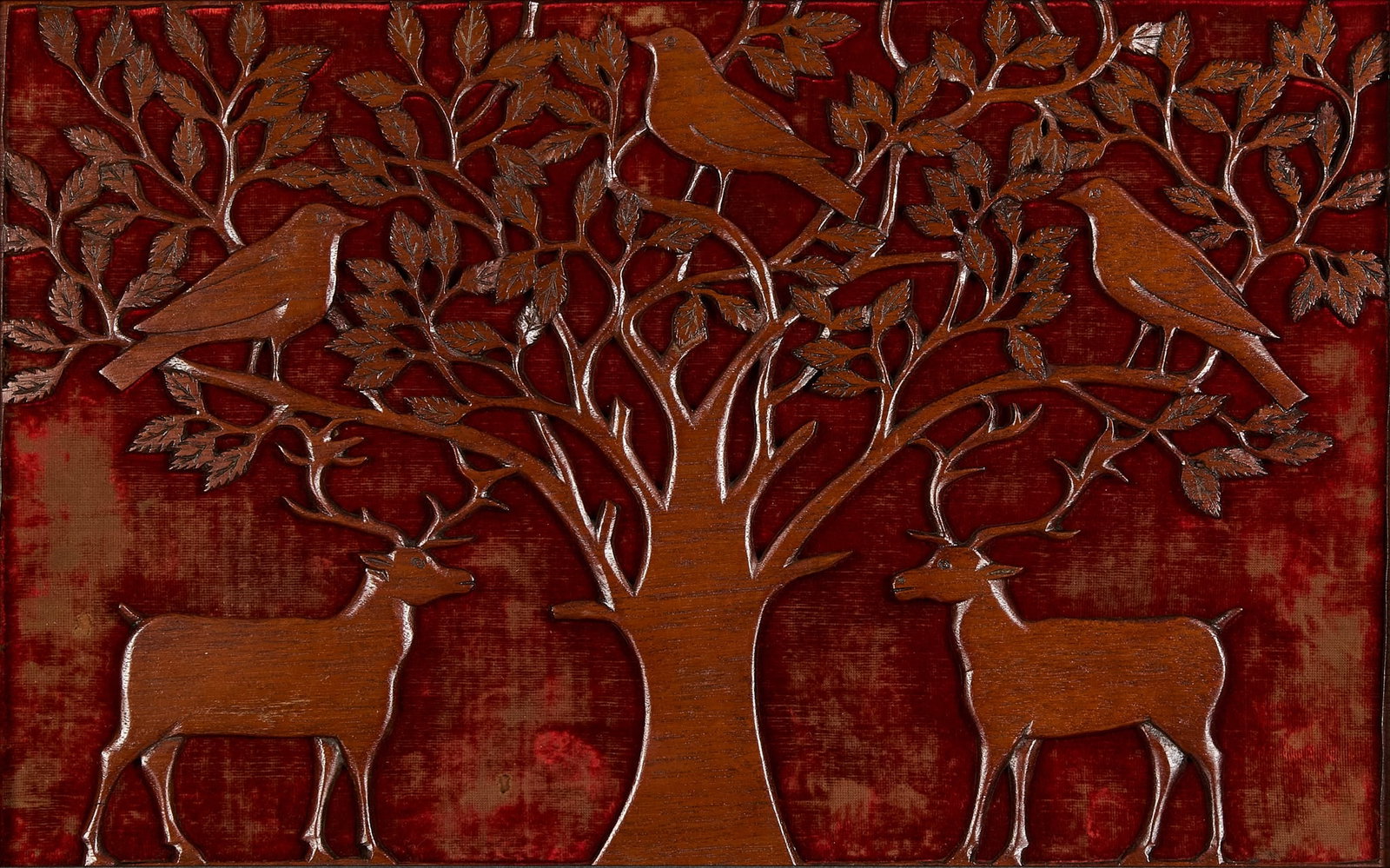 MANNER OF C.F.A. VOYSEY: MANNER OF C.F.A. VOYSEY FILIGREE PANEL, CIRCA 1900 carved and pierced wood reserved on a velvet ground, later framed 29cm x 45cm (frame size 37.5cm x 53.5cm)