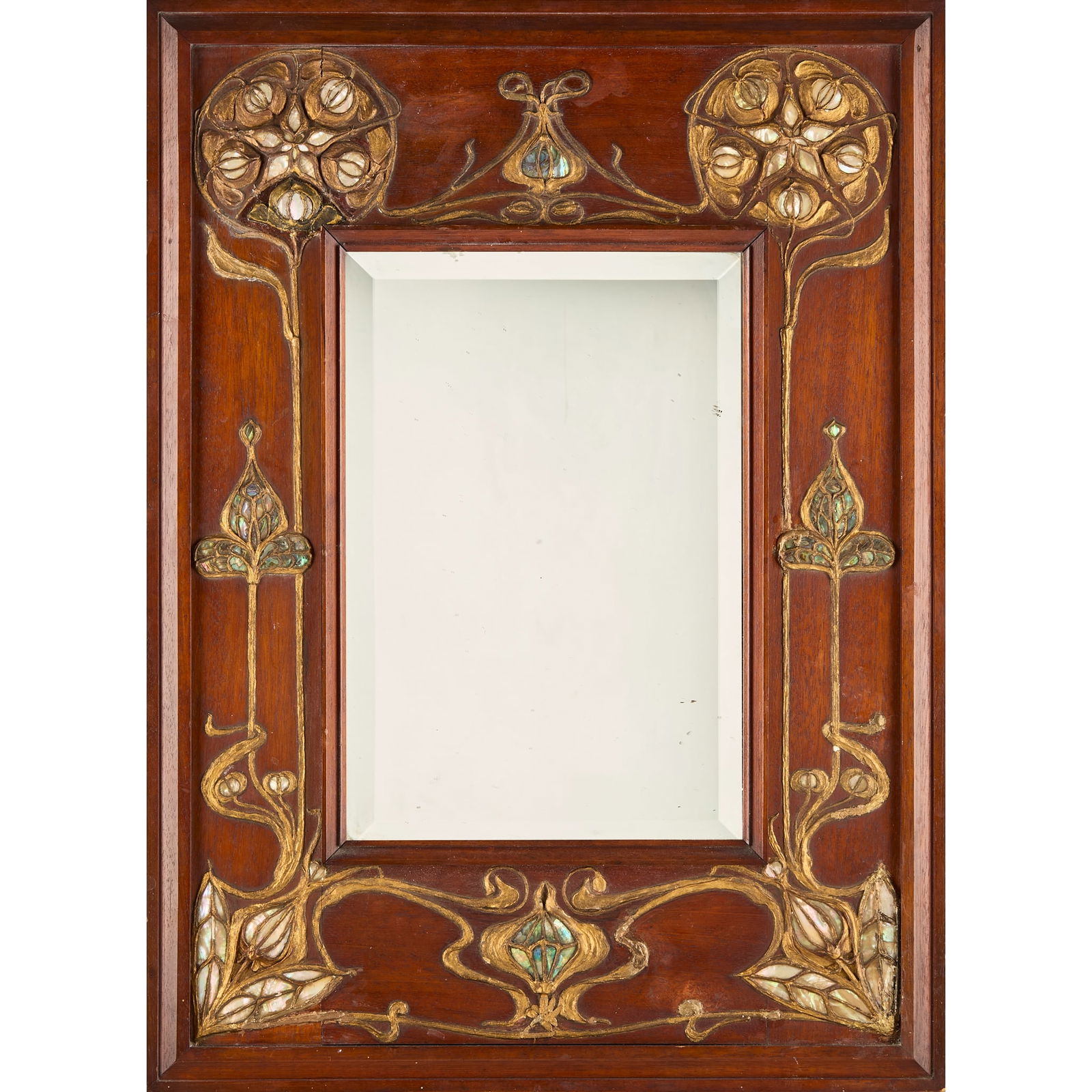 ENGLISH: ENGLISH ARTS & CRAFTS WALL MIRROR, CIRCA 1900 mahogany, gesso, abalone and mirrored glass 61.5cm x 45.5cm