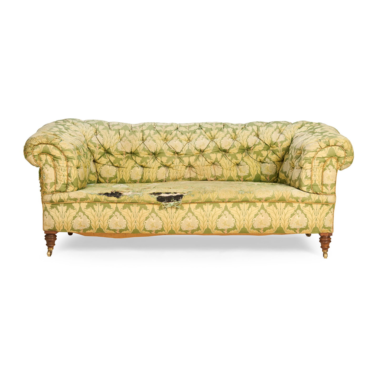 ENGLISH: ENGLISH VICTORIAN CHESTERFIELD SETTEE, CIRCA 1860 buttoned Art Nouveau upholstery, with walnut turned front legs and brass castors 200cm wide, 75cm high, 88cm deep