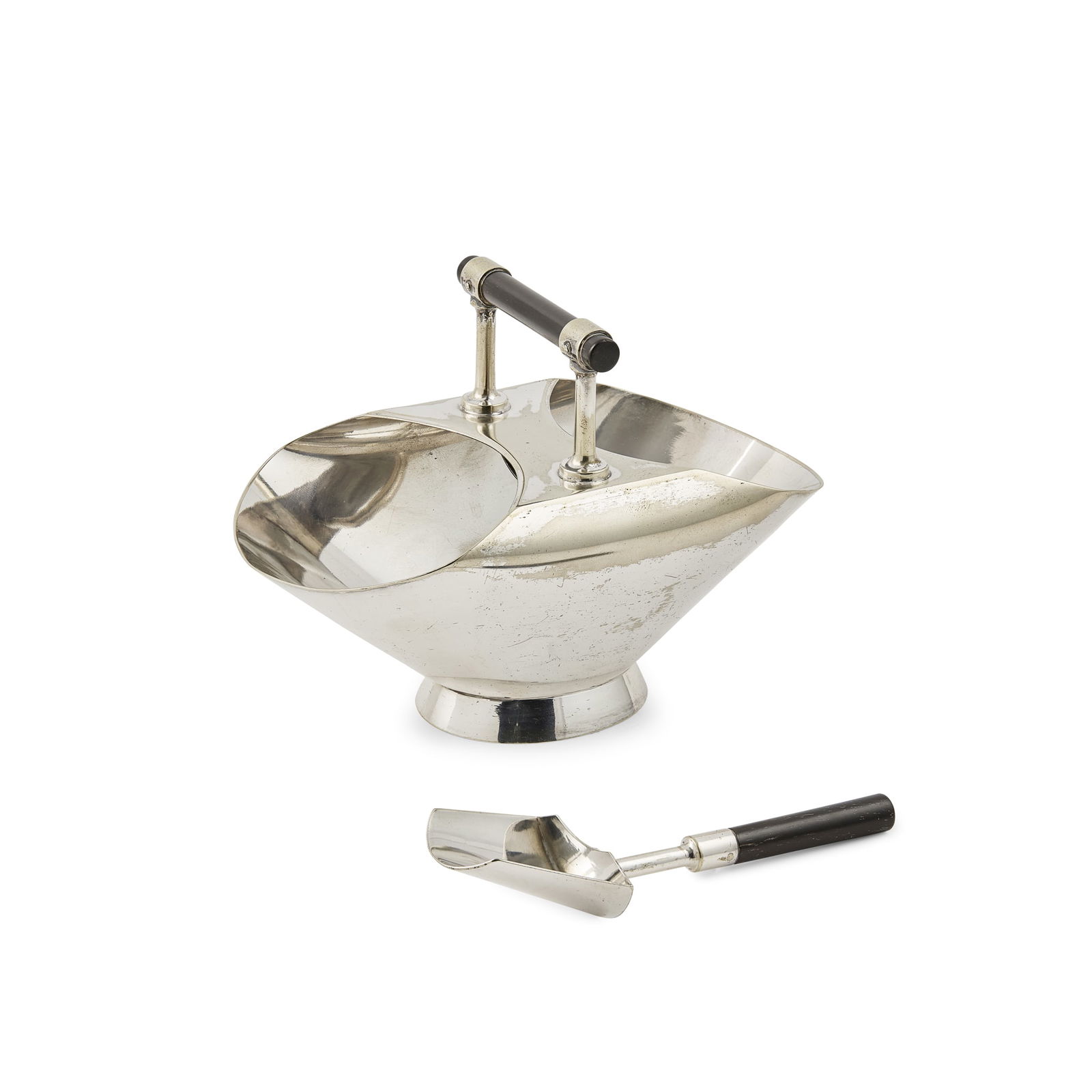 CHRISTOPHER DRESSER (1834-1904) FOR HUKIN & HEATH: CHRISTOPHER DRESSER (1834-1904) FOR HUKIN & HEATH SUGAR BOWL WITH SCOOP, CIRCA 1880 silver plate and ebonised wood, stamped maker's mark H&H;, no. 2372 (2) bowl 16.8cm wide, scoop 13.5cm long Private