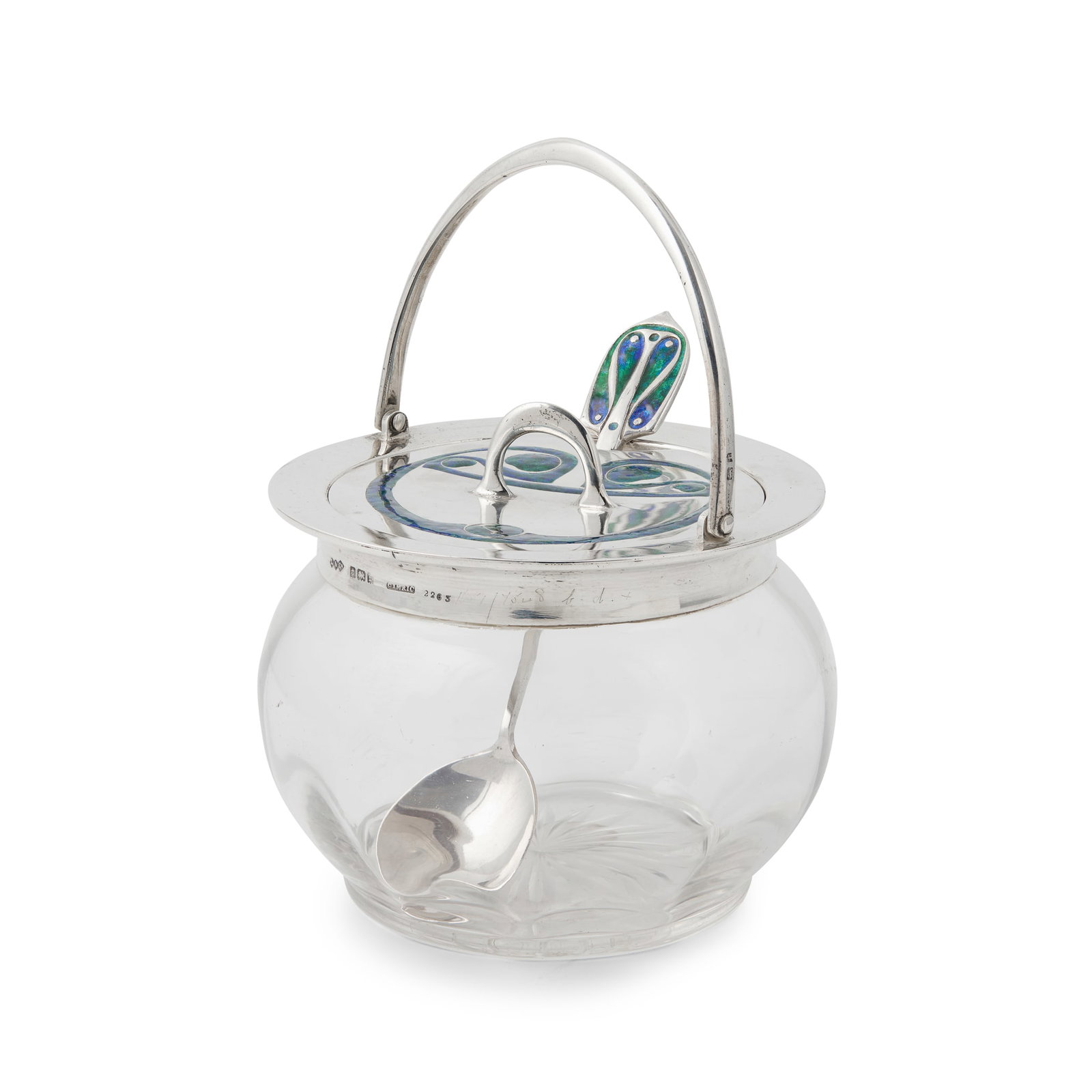 ARCHIBALD KNOX (1864-1933) FOR LIBERTY AND CO.: ARCHIBALD KNOX (1864-1933) FOR LIBERTY AND CO. 'CYMRIC' JAM POT, COVER AND SPOON, 1905 silver, glass and enamel, stamped retailer's mark L & CO, CYMRIC 2263, hallmarked Birmingham 1905, spoon hallmark