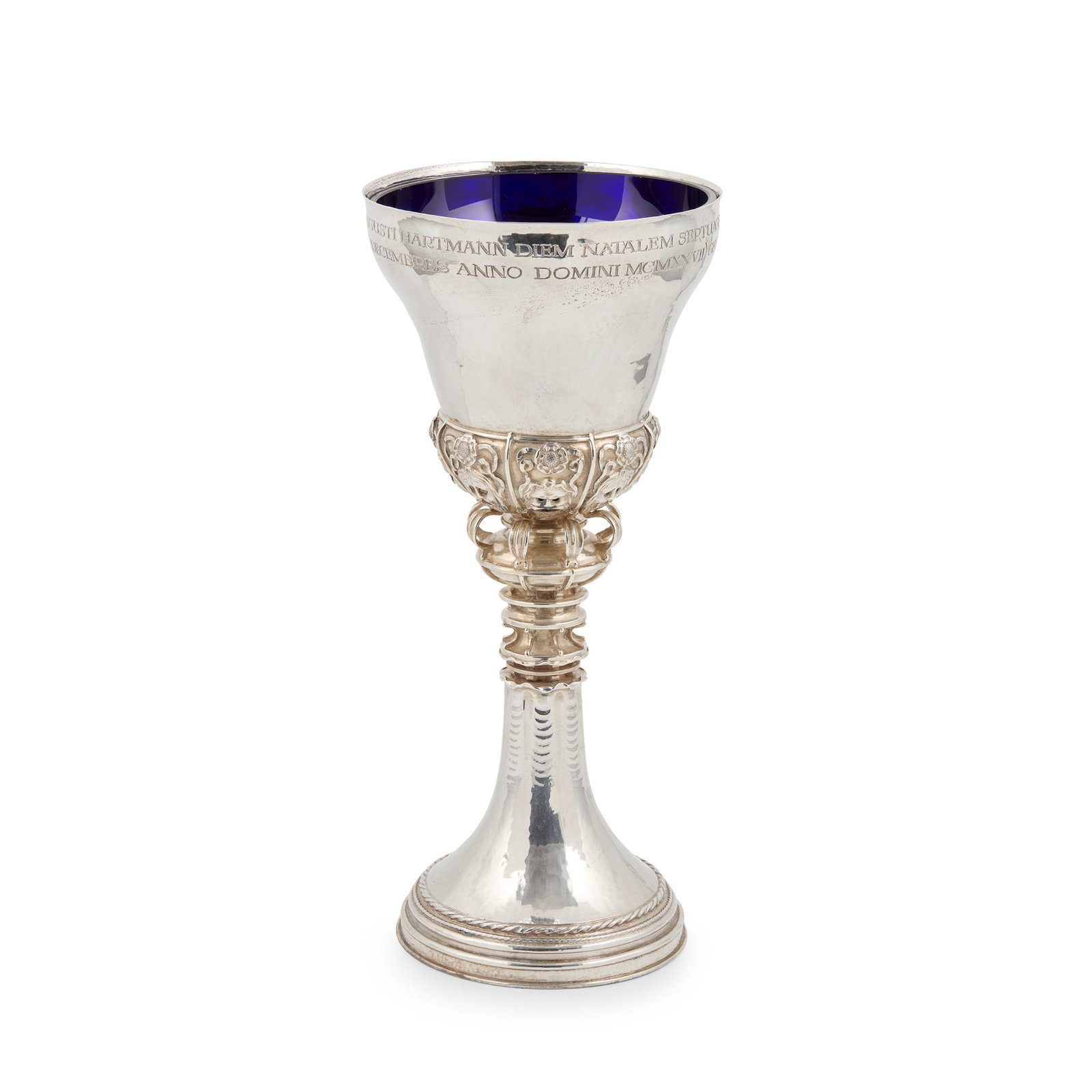 OMAR RAMSDEN (1873–1939): OMAR RAMSDEN (1873–1939) ARTS & CRAFTS GOBLET, 1923 silver, with later blue glass liner, engraved beneath the rim with Latin inscription dated 1927 commemorating the 70th birthday of Augustus Ha