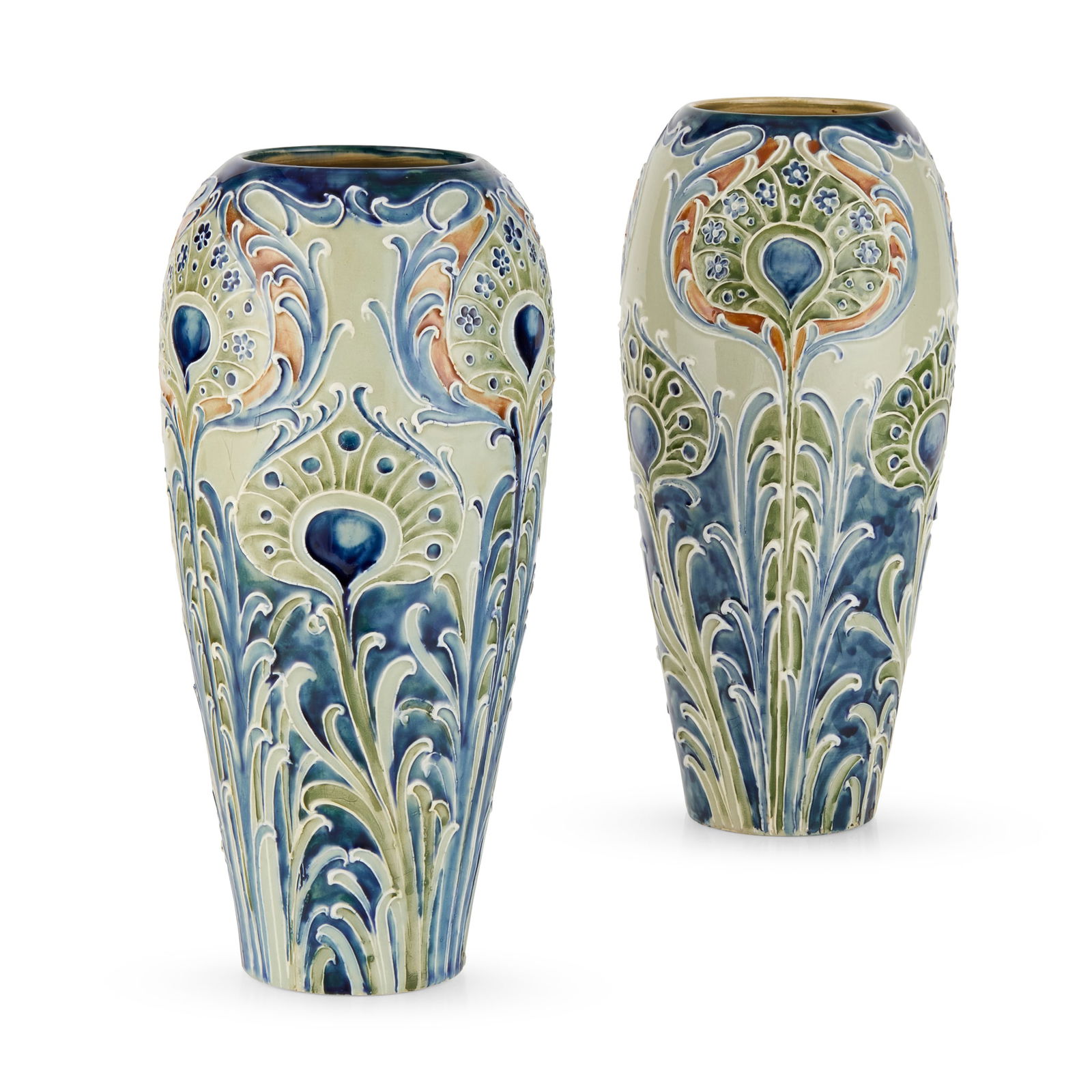 WILLIAM MOORCROFT (1872-1945) FOR JAMES MACINTYRE & CO.: WILLIAM MOORCROFT (1872-1945) FOR JAMES MACINTYRE & CO. NEAR PAIR OF 'PEACOCK' FLORIAN WARE VASES, CIRCA 1900 glazed earthenware, signed W. MOORCROFT/ DES., printed registration number 347807 (2) 