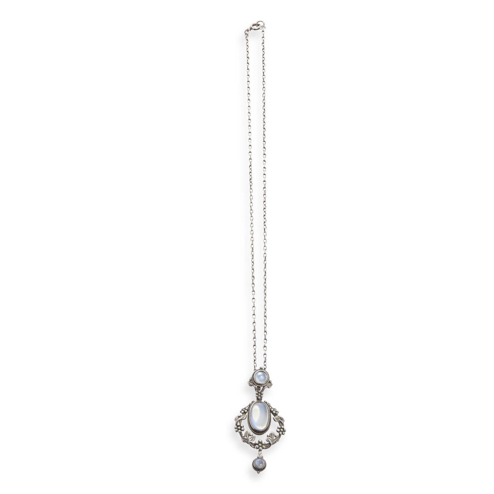 MANNER OF JESSIE M. KING: MANNER OF JESSIE M. KING ARTS & CRAFTS PENDANT NECKLACE, CIRCA 1905 silver, moonstone cabochons chain 41cm long, pendant 5cm