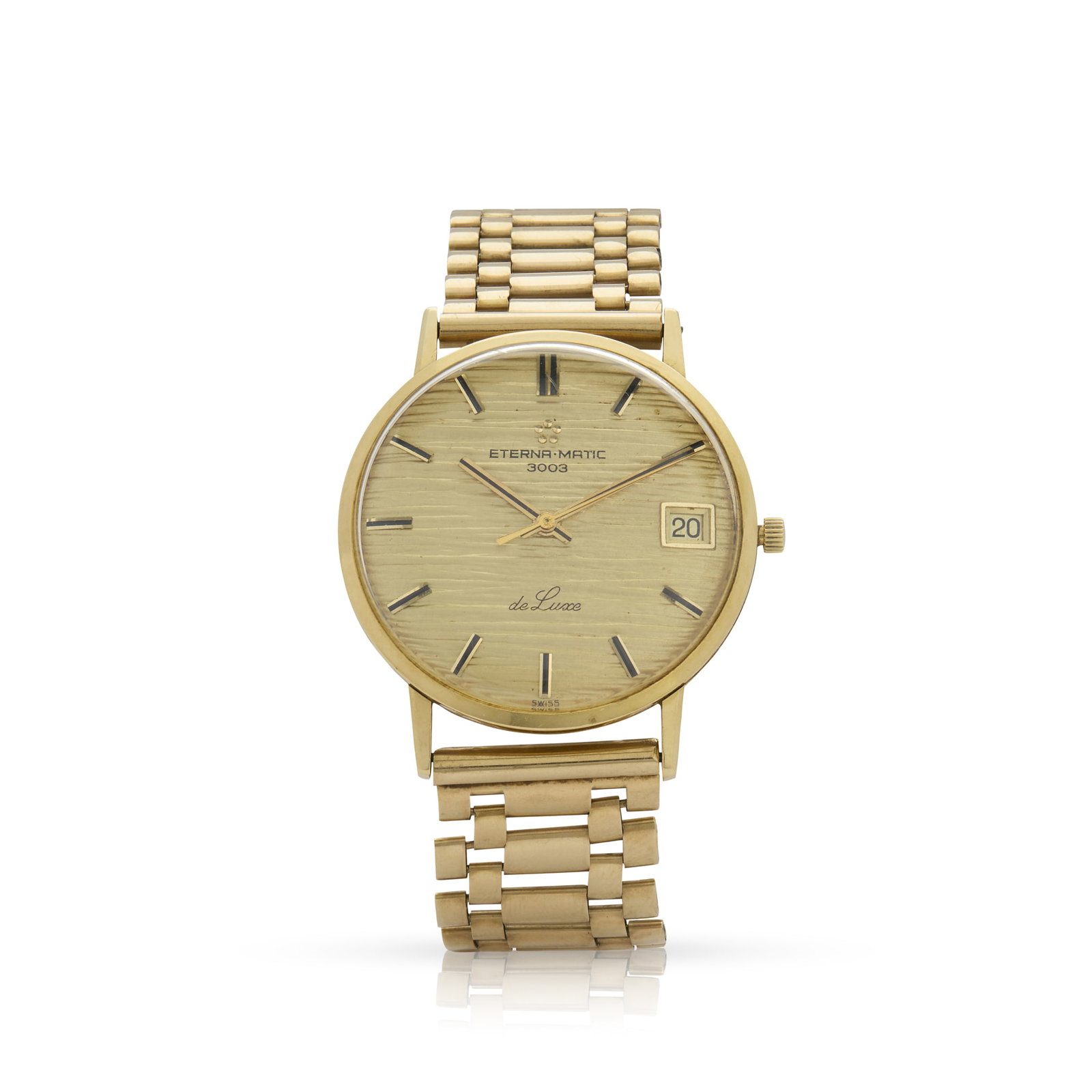 Eterna. An 18k gold automatic wristwatch with date on an associated 9k gold bracelet (1 of 1)