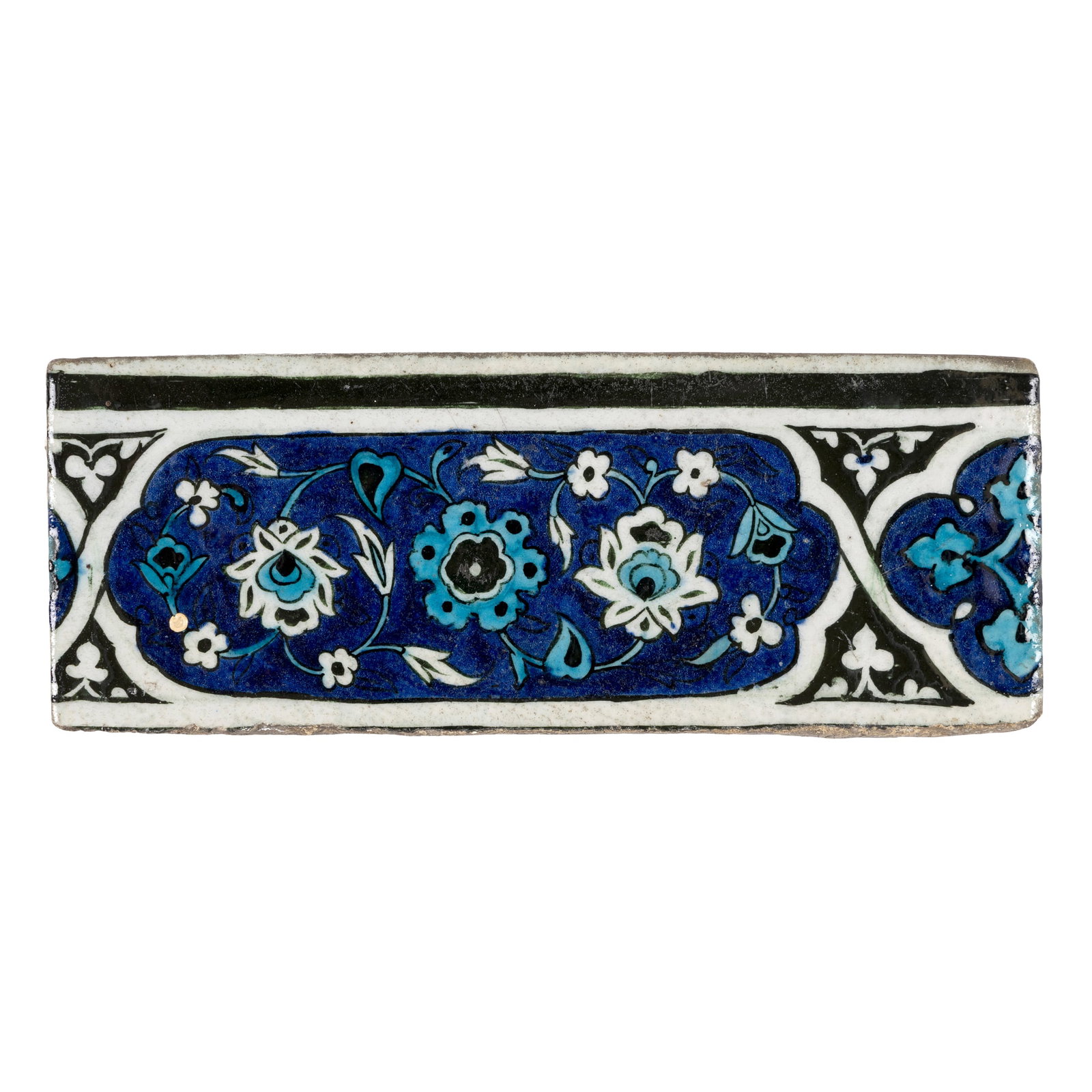 A 'DOME OF THE ROCK' POTTERY TILE: A 'DOME OF THE ROCK' POTTERY TILE PROVINCIAL OTTOMAN, JERUSALEM, CIRCA 1550 of rectangular form, painted in cobalt blue, turquoise, and black on a white ground under a transparent glaze, featuring a l