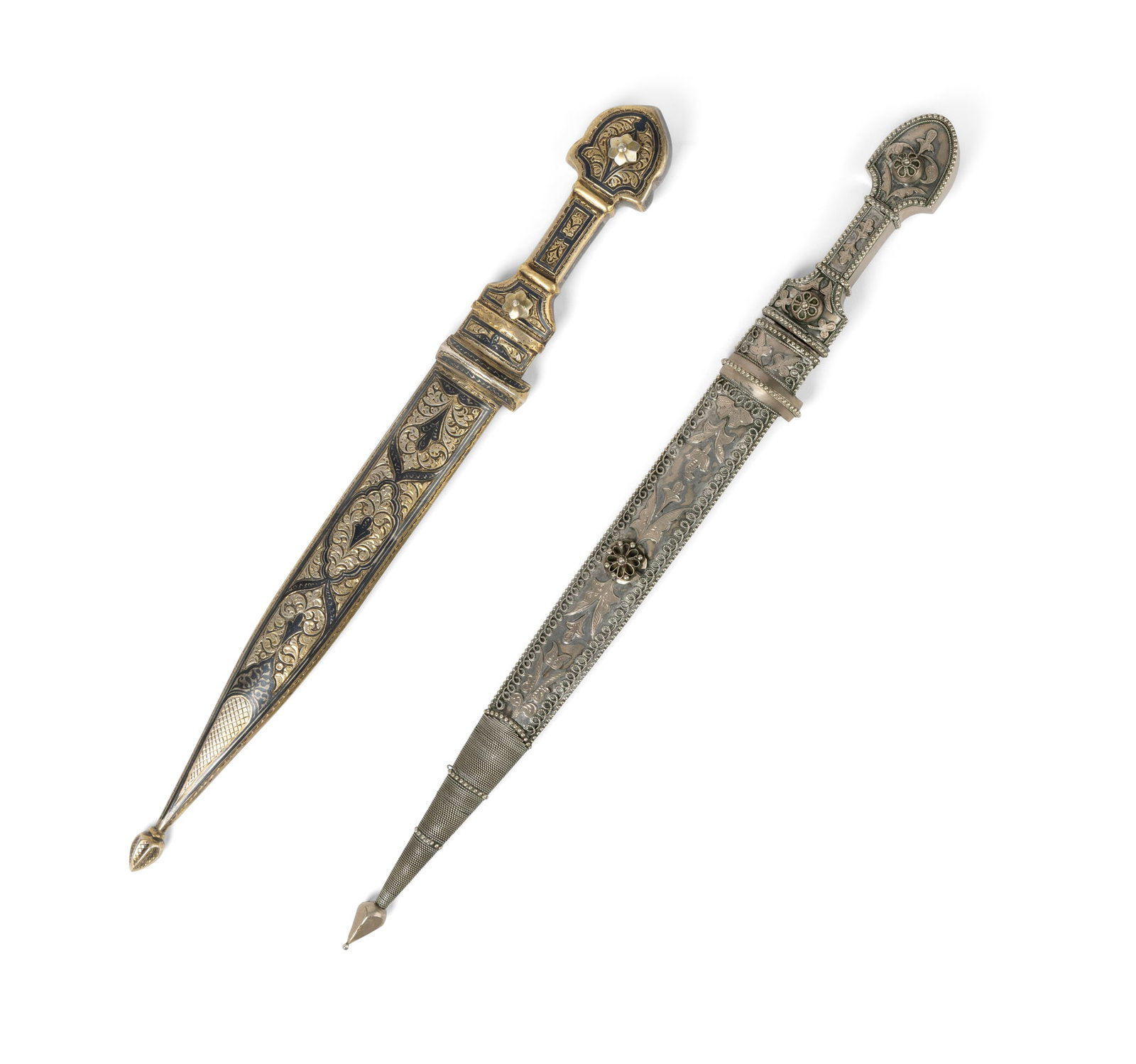 TWO SILVER-MOUNTED DAGGERS OR KHANJALI: TWO SILVER-MOUNTED DAGGERS OR KHANJALI CAUCASUS, 19TH CENTURY each with straight-tapering steel blades, one with parcel-gilt and silver niello mounts, the other with silver filigree and decoration in 